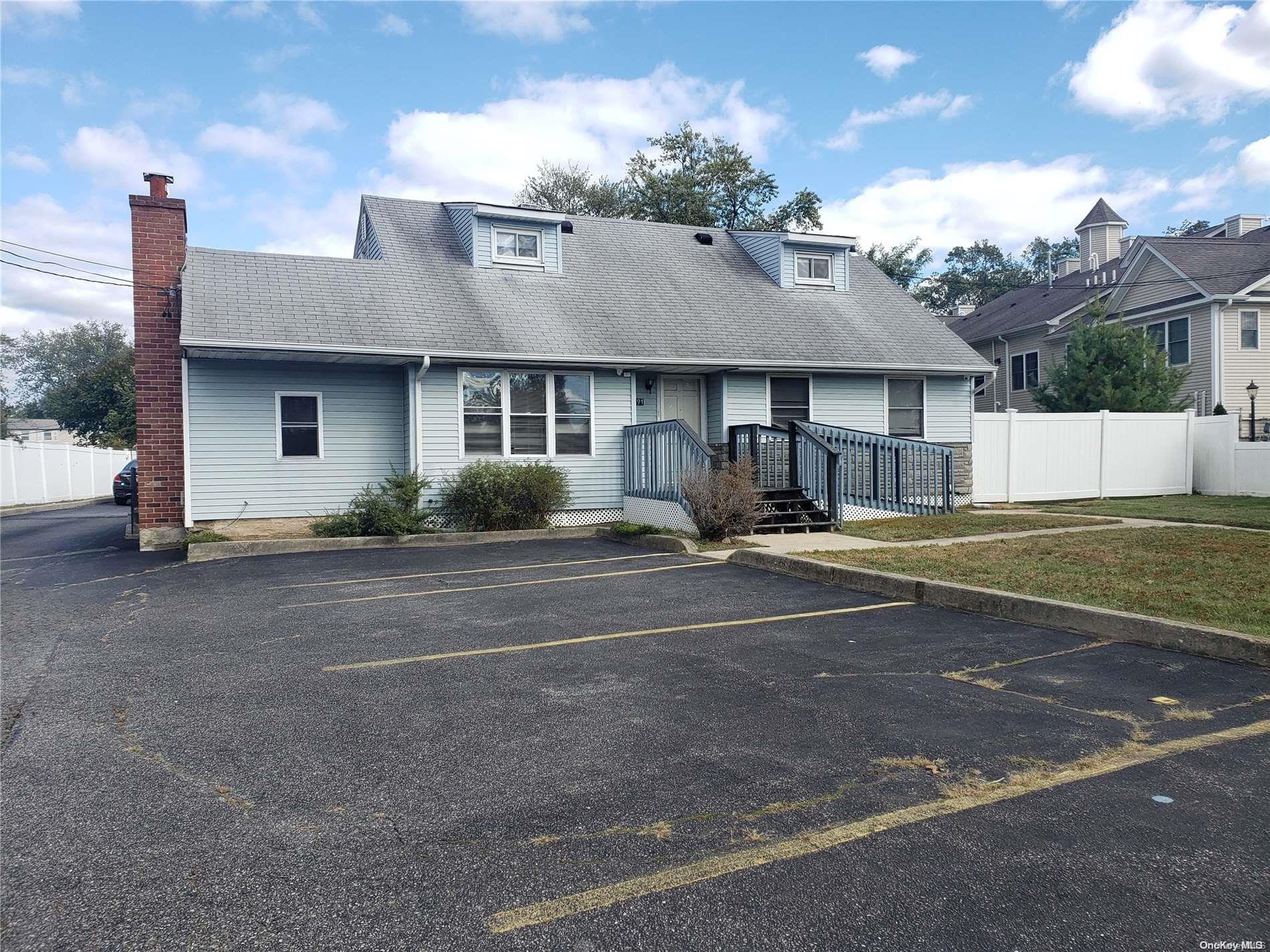Commercial Property Zoned E Business Currently for Sale as an Investment Property or as an Owner/User. Current Tenant is Halo Network and They Will Agree to Extend Their Lease Which Expires July 31, 2025. Current Monthly Rent is $4,590/Month and $55,080/Year. Net Annual Income of $36,000. Fully Blacktopped Property Size of 90' x 30' with Plenty of Parking. PRICE REDUCTION OF $50,000!