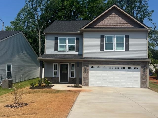 The Heatherwood (Lot 18) offers a modern, open concept living area perfect for entertaining.  4 bedroom, 2.5 bath. Complete with the trademark chair rail, crown molding, and rope lighting.  12'x12'' covered back patio.   30-year architectural shingles, site-built construction, and a 10 year limited warranty are included to give you peace of mind.  Preferred Lender/Attorney Closing Costs Incentive Offered! Completion set for June 2025. *Virtual tour reflects same house plan, not exact house.