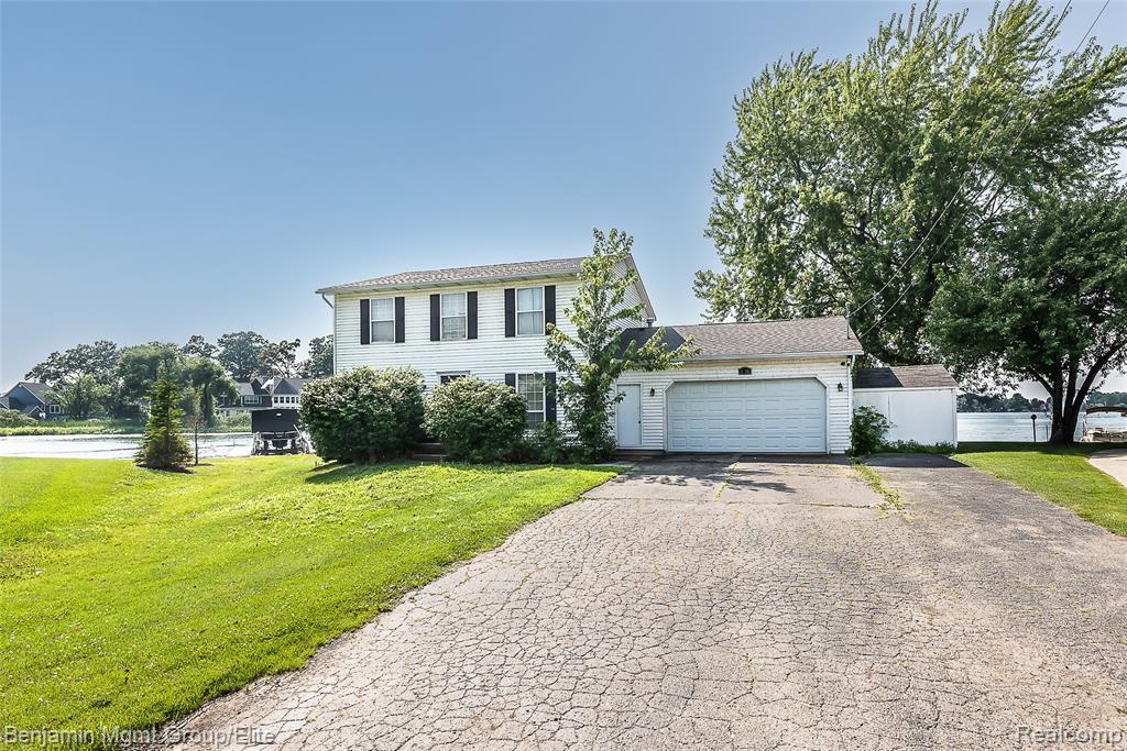 Lakefront Opportunity on Lake Fenton! This 3-bedroom, 2.5-bath home offers direct frontage on the highly desirable all-sports Lake Fenton—an incredible chance to own a piece of lake life. Enjoy stunning water views from the main living spaces and a backyard with endless potential for outdoor entertaining, boating, or relaxing by the shore. Inside, the home offers a spacious layout with a large lakeside great room, dedicated dining room and attached garage. While the home is in average condition and may benefit from cosmetic updates, it provides a solid foundation for customization and value-add improvements. Whether you're looking for a full-time residence, summer retreat, or investment property, this lakefront gem is ready for your vision! BATVAI.