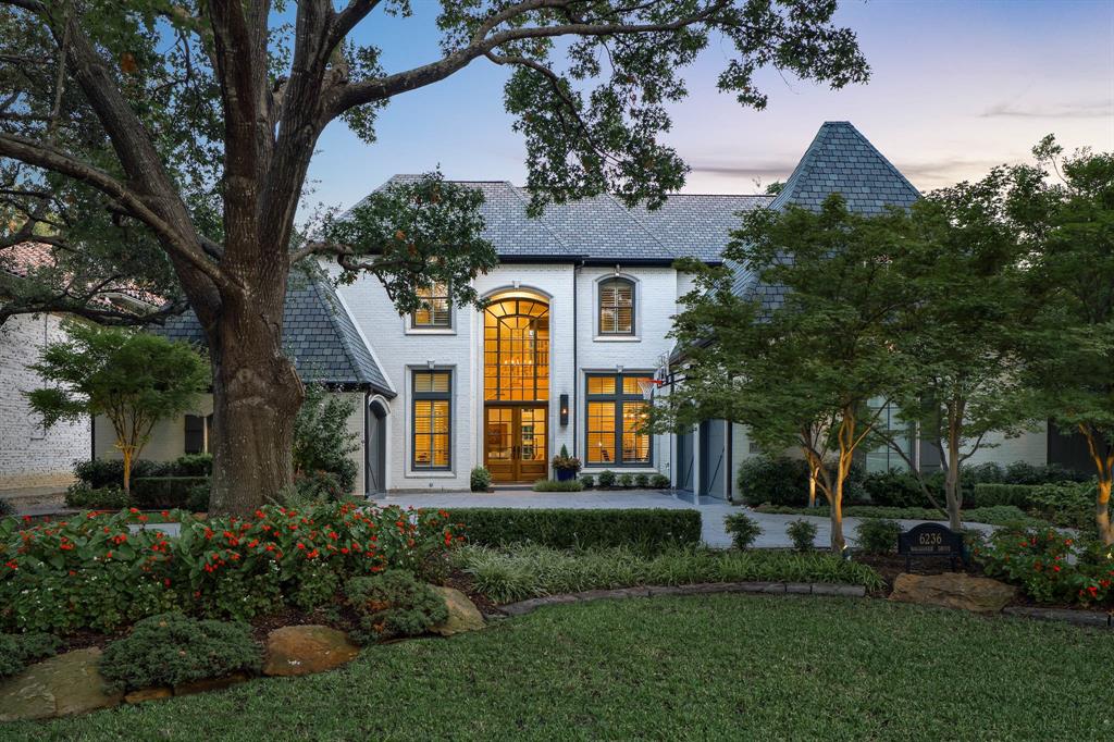 Welcome to a beautifully updated home in the heart of the Fairway of Preston Hollow — where timeless architecture meets relaxed modern luxury. Thoughtfully renovated between 2020 and 2025, this 5,228-square-foot residence per appraiser is filled with natural light, soaring ceilings, and rich custom millwork. The layout is both elegant and inviting, with five spacious bedrooms, four full baths, two powder rooms, and a flowing design that makes entertaining effortless. The first floor features a sophisticated study, formal dining room, and multiple living areas — including a warm and welcoming family room with a fireplace, built-in wet bar, and easy access to the outdoor terrace. At the heart of the home is a stunning, fully updated kitchen outfitted with top-of-the-line appliances, quartzite countertops, a gas cooktop, double convection ovens, and a generous prep island. A spacious breakfast area connects seamlessly to the main living spaces, creating the perfect gathering spot for casual meals or morning coffee. The first-floor primary suite offers the perfect retreat with dual walk-in closets, a spa-style bathroom featuring separate vanities, a dressing counter, a jetted tub, and a well-designed layout that feels both functional and indulgent. Step outside to enjoy a pergola-covered entertaining terrace complete with a built-in fire pit and a beautifully turfed lawn, surrounded by lush, mature landscaping that provides privacy and year-round beauty. Additional highlights include garage parking for three cars,  huge storage, and timeless architectural details throughout. Every corner of this home reflects a thoughtful balance of comfort, style, and sophistication. Perfectly situated in the Fairway of Preston Hollow, this residence offers quick access to top-rated schools, premier shopping, dining, and everything Dallas has to offer.
