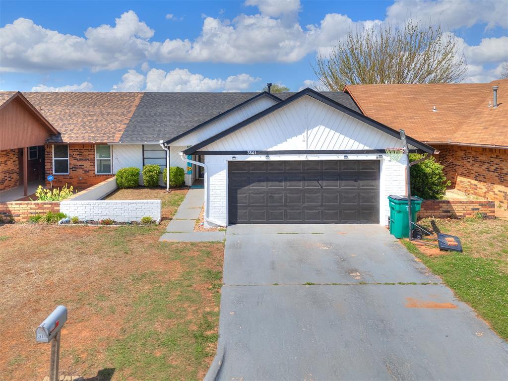 Charming 2 bed / 2 bath half-duplex (1,181 sq ft) with thoughtful updates and no HOA — ideal for first-time buyers or investors. Recent improvements include a 2024 roof, new carpet in both bedrooms, fresh paint in the master and exterior, and newer living-area flooring. Perfect sized kitchen with a bar dining option. Inside laundry, a two-car garage, and a covered patio make daily living easy, and the yard is perfectly sized for low-maintenance enjoyment. Conveniently within walking distance to Western Heights High School and minutes from shopping and dining. Welcome home!