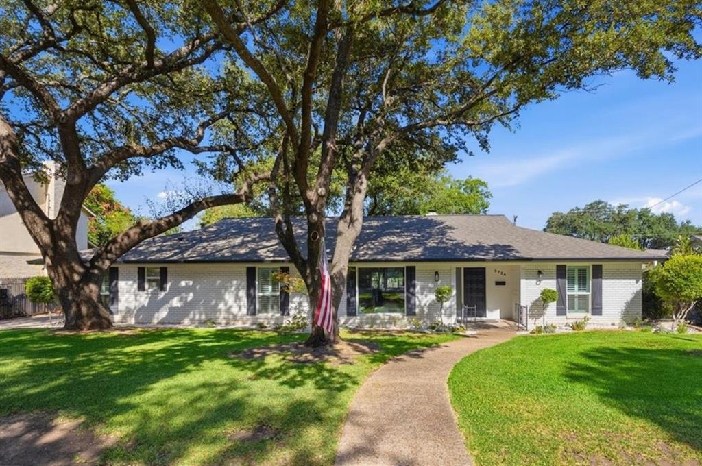 Located in the heart of Overton Park on a beautiful tree-lined street, this inviting home offers great curb appeal and a light-filled, open floor plan designed for comfortable everyday living and entertaining. The spacious living area features a picturesque window overlooking the front yard and flows seamlessly into the updated kitchen with quartz countertops, stainless appliances, ample cabinetry and generous counter space. A bright sunroom overlooking the serene backyard provides flexible additional living space ideal for a playroom, study or sitting area. The spacious primary suite features a beautifully updated bath with dual vanities, quartz countertops, a soaking tub and separate shower. Outside, mature trees shade the backyard and create an inviting setting for outdoor entertainment, while a rear-entry garage and gated driveway provide added privacy and convenience. Zoned to highly sought-after Overton Park Elementary and ideally located near shopping, dining, Trinity Trails, TCU and major highways, this home offers an exceptional combination of space, convenience and location.