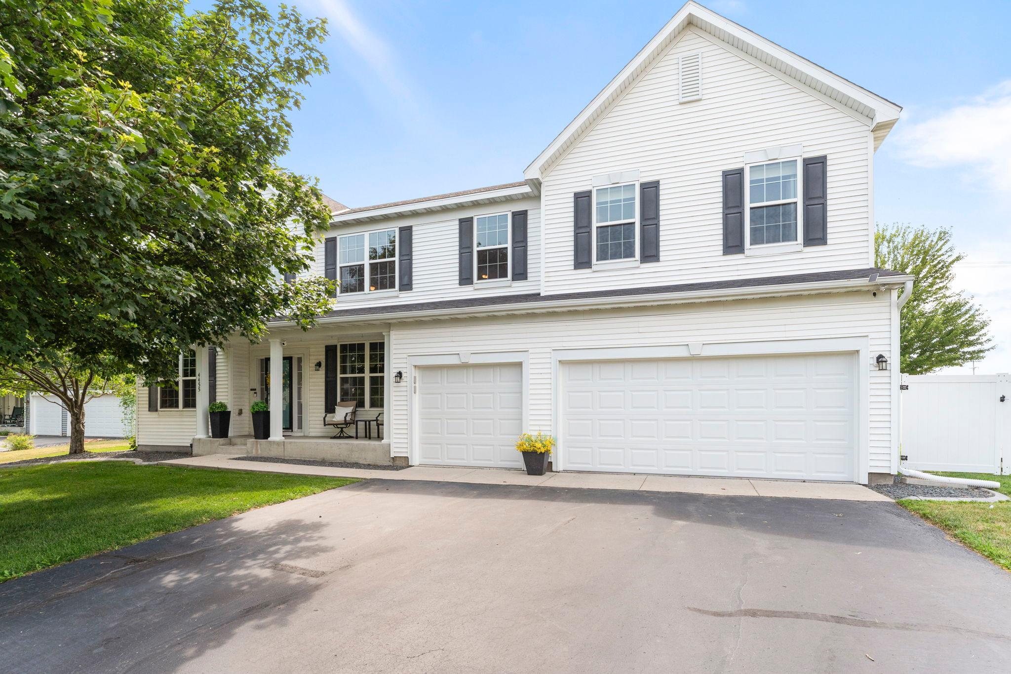 Welcome to this stunning six-bedroom, four-bathroom home in a highly sought-after Saint Michael neighborhood within the STMA School District. Offering the perfect blend of privacy, convenience, and community amenities, this home is located near schools, parks, shopping, dining, and everyday essentials, while also featuring neighborhood amenities including a community pool, playground, and basketball court. From the moment you arrive, you’ll appreciate the exceptional curb appeal with newer siding and roof, newer privacy fence, new garage doors equipped with cameras that provide convenient access to live footage through a phone app, concrete edging, raised garden beds, stamped patio, and poured concrete slab along the back of the home, complete with a gas line hookup for a grill—perfect for convenient outdoor cooking and entertaining without the hassle of propane tanks.Step inside to an inviting open-concept layout with 9-foot ceilings, abundant natural light, and thoughtfully designed spaces for everyday living and entertaining. The chef-inspired kitchen features expansive Cambria countertops, a large center island with breakfast bar seating, abundant cabinetry, and stainless steel appliances. The kitchen flows seamlessly into the informal dining area with access to the screened-in three-season porch, complete with a ceiling fan—perfect for morning coffee, evening sunsets, or entertaining while enjoying views of the spacious fully fenced backyard. The main-level living room offers carpeting, a cozy gas-burning fireplace, and a large window filling the space with natural light. A formal dining room, flexible main-level bedroom or office with built-in storage, convenient half bathroom, and spacious mudroom with built-in benches and storage complete the main level. The upper level features four bedrooms, including a spacious primary suite with vaulted ceilings, walk-in closet, and private ensuite bathroom with dual vanities, separate shower, and soaking tub. Three additional bedrooms offer generous space and closet storage, while the loft area provides flexible living space for a family room, playroom, or workspace. A convenient upper-level laundry room adds functionality. The finished lower level offers additional living space with a large family room and recreation area, a sixth bedroom with walk-in closet and egress window, second laundry area, and full bathroom with oversized vanity and tub/shower combination. Additional highlights include an irrigation system to help keep the grass green and looking its best, HOA-covered trash and recycling, a new air-to-air exchanger, new water heater, and newer sump pump with battery backup. With its spacious layout, extensive updates, private backyard, and fantastic neighborhood amenities, this exceptional home is ready to welcome you home!