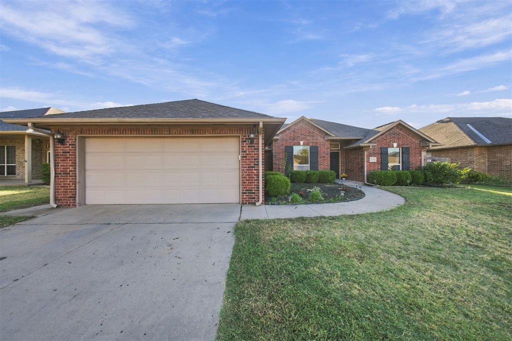 Welcome to this charming well cared for home!! When you enter the home you are greeted with an open concept floorpan with a large living room with beautiful wood-like flooring . Lots of windows allowing natural sunlight to flow throughout. The kitchen offers tons of cabinet and countertop space, electric cooktop, built in microwave and oven, and a pantry. Your master retreat offers a double vanity huge soaking tub, large walk in closet. In addition, there are two dining areas, and the secondary rooms are large with plenty space. This home offers a beautifully manicured backyard with a covered patio.