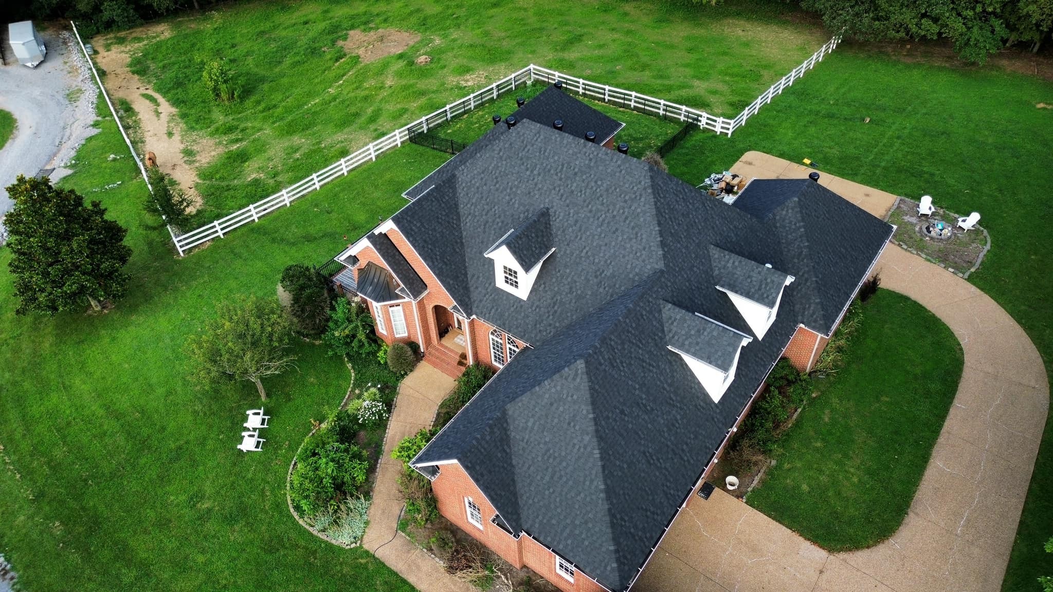 Welcome to this exceptional property designed for both refined living and equestrian passion. Nestled on 11.7 sprawling acres, this home offers nearly 5,400 sqft of finished living space, a fully equipped 36x36 Metal Horse Barn with Electric & 2 Water Spigots, multiple fenced pastures, and a 200x90 Arena making it the ultimate retreat for owners who value space, craftsmanship, and lifestyle. Step inside to discover an inviting open layout featuring 3 spacious bedrooms, 2.5 bathrooms, and a dedicated office overlooking the serene pastures on the main level. The living area is filled with natural light, while the kitchen features stainless double ovens, gas cooktop, and a warming drawer & microwave in the island. The office opens to a covered patio, perfect for morning coffee or evening sunsets. The second floor includes a bonus room, another bedroom with closet, but no window, and a full bathroom, ideal for guests or a private hobby space. The finished basement is a haven of versatility, complete with an office/gym, full bathroom, safe room, refrigerator, and cellar. A 3-Car Garage and basement workshop provide additional functionality, alongside ample storage and access to the outdoor spaces. 3 Impact Resistant Architectural Certainteed Landmark Shingle Roof installed July 2023 and updated back deck in October 2025 ensure peace of mind and lasting value.