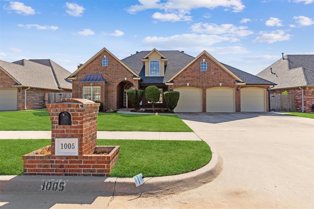 Lovely home on one of the biggest lots in the area, this four bedroom home has three bedrooms downstairs, all with their own private bathrooms and closets, and a large bedroom suite or bonus room upstairs, also with its own spacious closet and full private bathroom. The primary bedroom is large with attached primary bathroom complete with separate jacuzzi tub and shower and two vanities. Downstairs are two living rooms and dining spaces. The home also includes a stunning 483 square foot sunroom with separate heating and air conditioning (included in square footage). This space provides an ideal spot to relax and enjoy open views of the exquisite large backyard. Off of the oversized kitchen you will find a study space and a separate laundry room with plenty of storage. The kitchen has ample counter space and lots of built-in storage throughout. There is an eat-in breakfast bar as well as a dining space connected to the kitchen area. Updates include fresh paint inside and out, new carpeting, wood and tile floors throughout the downstairs space, as well as a large above-ground steel storm shelter in garage. This oversized lot has more than enough room for a pool. This is a terrific property you won't want to miss. Schedule your private showing!
