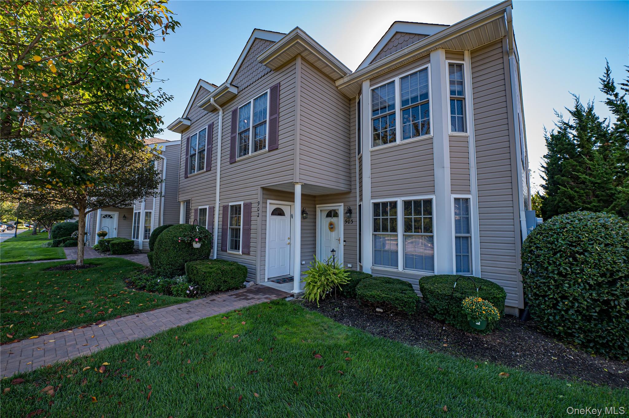 Bright Renovated Corner Unit! Every detail was thoughtfully designed from the moment you walk into this beautifully updated 2-bedroom, 2-bath Upper Cordova model located in the highly sought-after Greens at Half Hollow (55+ community). This sun-filled corner unit features vaulted ceilings, recessed lighting, and a private balcony. The stunning updated kitchen is the heart of the home, showcasing floor-to-ceiling white shaker cabinetry, a gorgeous subway tile backsplash, under-cabinet lighting, and modern stainless steel appliances. The spacious primary suite offers a walk-in closet and an elegant en suite bath, while the guest bedroom/den provides balcony access for relaxing afternoons. A bonus bump-out space, ample storage, pull-down attic access, custom molding throughout and a renovated second full bath complete this exceptional home.
Enjoy resort-style living at The Greens with a 24-hour attended gatehouse, regular security patrols, and a vibrant clubhouse featuring an indoor/outdoor pool, gym, spa, sauna, steam room, card room, restaurant, and library. Take part in group activities, tennis, and walking trails, with access to an optional 18-hole golf course and on-site restaurant with no minimum.  Appearance: Diamond+++