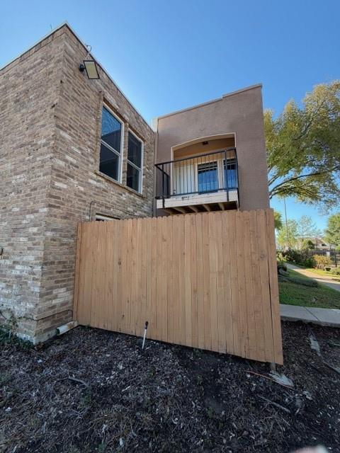 Woodhaven gated community. Spacious private 2 story condo with 3 bedrooms and 2 bathrooms. First floor features open floor-plan with updated kitchen and dining open to the living room. Primary bedroom suite with two closets and update bathroom with walk-in shower. Second floor includes two generously sized bedrooms with updated bathroom with dual sinks and balcony deck. Private fenced patio. All new windows, paint and blinds throughout condo. Community pool and on-site laundry facilities. Conveniently located to shopping, dining, parks, entertainment and major highways.