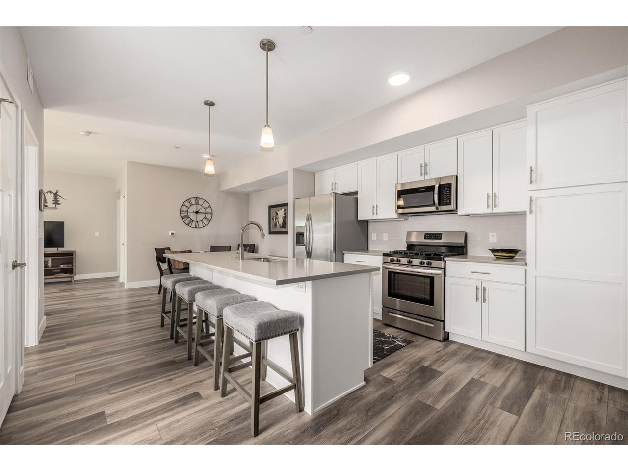 Light, mountain views, and effortless Lafayette living come together at 210 S Cherrywood Drive #204. This move-in-ready 2 bed / 2 bath condo is a bright southwest-facing end unit with an open layout, lots of windows, and a private balcony made for morning coffee and Colorado sunsets. The primary suite includes a private bath, while the flexible second bedroom works equally well for guests, a home office, or both. Everyday convenience is covered with elevator access, in-unit laundry, secured entry, a detached 1 car garage, and nearby guest parking. Cherrywood residents also enjoy a private dog park, grilling area, and bocce ball court. When it's time to get out, Coal Creek Trail is just minutes away, and the restaurants, breweries, coffee shops, and year-round events of Old Town Lafayette are only a little over a mile from home. With easy access to Boulder, Louisville, shopping, and commuter routes, this is low-maintenance Boulder County living in all the right ways. Furnishings are negotiable.
