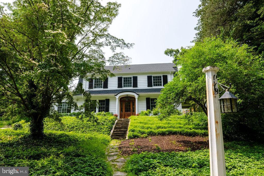 Welcome to 401 Gayley Street, a beautifully updated and impeccably maintained home located just a short walk from the vibrant heart of downtown Media. This gracious four-bedroom, three full and two half-bathroom home offers the perfect blend of character, convenience, and thoughtful modern upgrades—all nestled in the award-winning Rose Tree Media School District.From the moment you arrive, the charm of this home is unmistakable. A stately entryway leads into a sun-filled foyer, where original architectural details are paired with tasteful updates. At the heart of the home is an expansive, renovated kitchen featuring premium granite counters, abundant cabinetry, a center island with seating, double wall ovens, a beverage fridge, second prep sink, and a built-in tap ready for your favorite draft—ideal for hosting gatherings large or small. The home offers generous, flexible living spaces including a large living room, formal dining area, and a bonus family room. The second floor includes a spacious primary suite with a walk-in closet and updated en-suite bath, alongside two additional bedrooms and beautifully appointed full bath. On the third floor find the fourth bedroom with ensuite full bath as well as generous attic storage.  The partially finished basement includes a home theater/rec room, a separate laundry area, and storage. Outdoor living is equally impressive. Step onto the private backyard slate patio to discover a stunning stone fireplace and built-in pizza oven—perfect for year-round entertaining. A charming covered side porch offers another peaceful retreat, while the detached three-car garage and storage shed provide incredible utility. With public transportation and State Street’s dining, shops, and community events just blocks away, this home is perfectly positioned for walkability and connection. Whether you're entertaining, working from home, or simply enjoying the space, 401 Gayley Street rises to meet the moment.