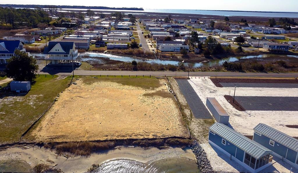 PRIME WATERFRONT On the Chincoteague Channel. Southern End of the Island on MAIN STREET. Zoned C4. BUILD RESIDENTIAL OR COMMERCIAL. Many uses with C4. SO MUCH POTENTIAL on this Deep Water Channel. SUNSETS are Amazing! Build your Dream Home or Business Here!