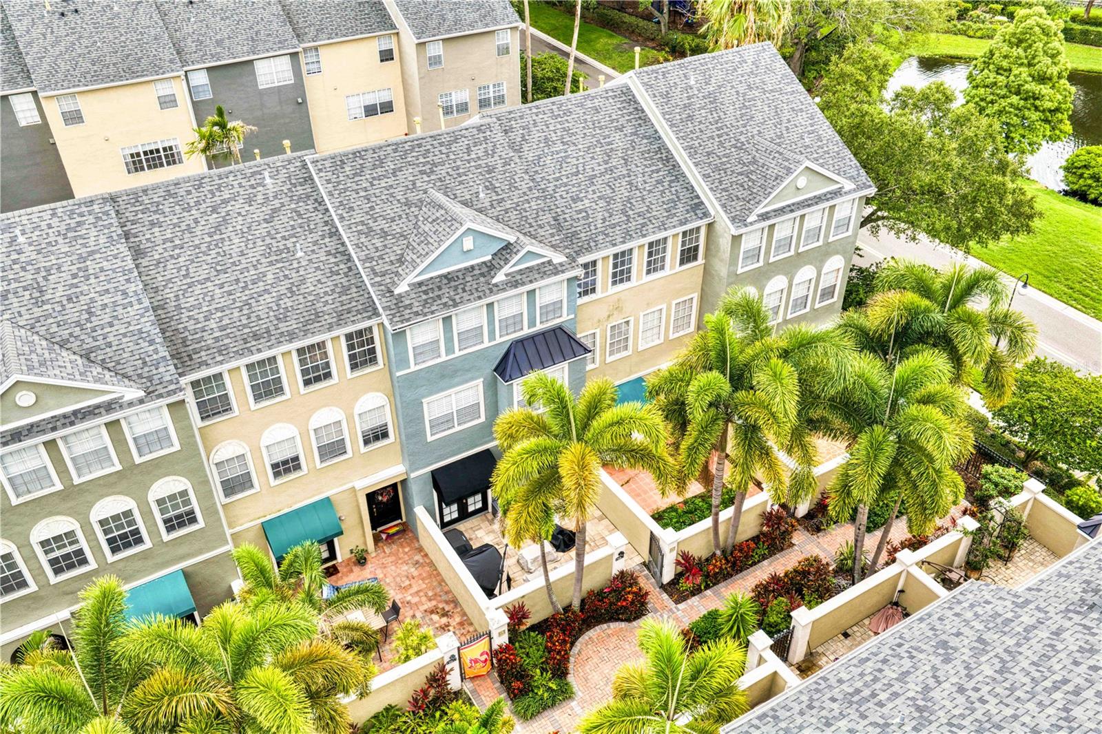 Experience the best of Harbour Island living in this beautifully maintained three-story brownstone-style townhome located within one of Tampa's most desirable gated communities. Offering 3 bedrooms, 2.5 bathrooms, and a versatile first-floor bonus room, this residence blends classic architecture with modern comfort in an unbeatable location.The welcoming first level features a flexible bonus space ideal for a home office, media room, fitness area, or guest retreat, with French doors opening to a private courtyard that creates the perfect setting for relaxing or entertaining. The second floor showcases an open-concept living and dining area filled with natural light, complemented by a spacious kitchen featuring solid wood cabinetry, a gas cooktop, generous counter space, and a casual dining area. The third floor offers three well-appointed bedrooms, including a primary suite designed for comfort and privacy.Residents enjoy the security and convenience of 24-hour gated Harbour Island along with beautifully landscaped streets, parks, walking paths, and easy access to everything Tampa has to offer. Just moments from Water Street Tampa, Sparkman Wharf, Amalie Arena, the Tampa Riverwalk, Channelside, Downtown Tampa, premier dining, shopping, entertainment, and major commuter routes, this exceptional home offers the perfect combination of low-maintenance living and an unmatched urban lifestyle.Whether you're searching for a primary residence, a second home, or an investment in one of Tampa's premier waterfront communities, this move-in-ready townhome presents an outstanding opportunity to enjoy the Harbour Island lifestyle.