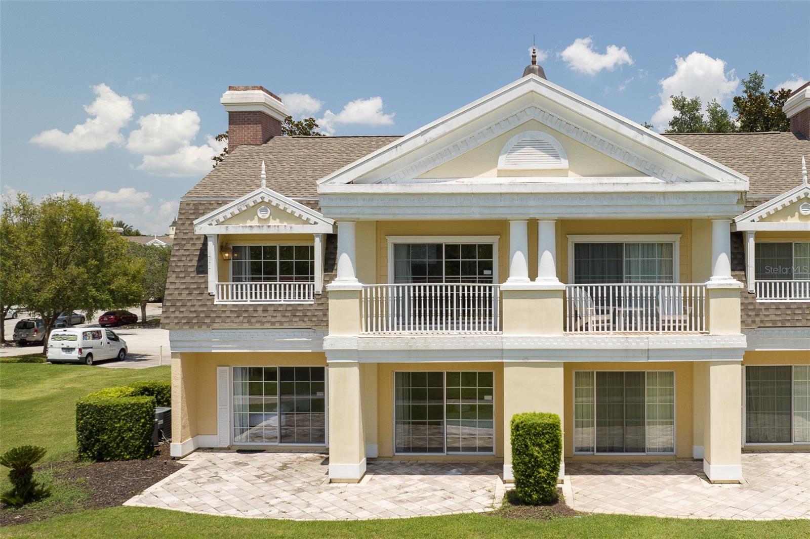 Experience the allure of this fully furnished, income-generating two-story condo features 3 bedrooms and 3 full bathrooms, including 2 master suites with private balconies overlooking the golf course. Nestled in Reunion's Seven Eagles Sec, the condo is steps from a community pool, gym, and spa, and opposite the Reunion Grand Hotel with a variety of dining options. Enjoy access to multiple pools, a gym, and championship golf courses designed by Arnold Palmer, Tom Watson, and Jack Nicklaus. With nearby attractions like Disney, SeaWorld, and Universal Studios within a 30-minute drive, and essential amenities close by, this property is perfect for personal getaways, long-term stays, or as a short-term rental investment. The spacious end unit offers natural light, a modern kitchen with sleek appliances and granite countertops, and bedrooms each with an ensuite bathroom. The HOA provides comprehensive services including security, cable TV, internet, and maintenance. Don’t miss the chance to own this ideal vacation home or investment property.