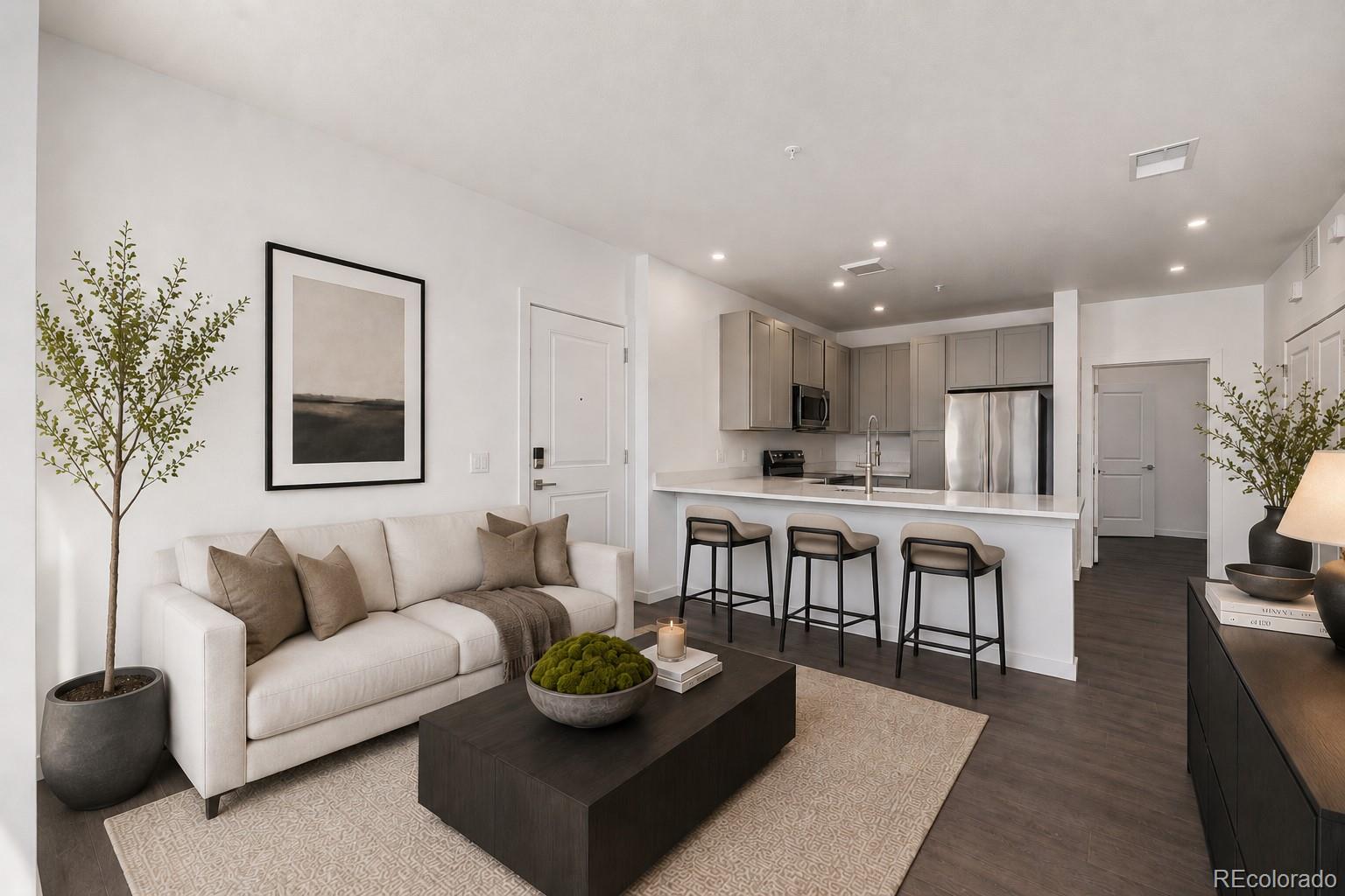 Think owning new construction in Sloan's Lake is reserved for million-dollar budgets? Think again. Welcome to one of the best values currently available near Sloan’s Lake - a brand-new 2-bedroom condo at The Scene offering the rare combination of modern finishes, functional layout, and an unbeatable location in one of Denver’s most in-demand neighborhoods. Inside, you’ll find a bright, open-concept floorplan with luxury vinyl plank flooring throughout, stainless steel appliances included, and a private balcony perfect for morning coffee or unwinding after a day in the city. The main living space feels incredibly spacious. The large kitchen with breakfast bar, extensive cabinet space, and quartz countertops opens into a light and bright living room. Two spacious bedroom are split by the bathroom, offering maximum privacy for guests, a roommate, a home office, or simply want flexibility for the future. And, unlike many condos in the community, this home includes a full bathroom with a tub - a feature that’s surprisingly hard to find in newer construction. But, as you know, the real magic here is the lifestyle. Imagine starting your mornings with a walk or run around Sloan's Lake, grabbing brunch nearby at Alma Fonda Fina, spending afternoons paddleboarding or biking the trails, then heading downtown for dinner, concerts, or a Nuggets game - all while being just a quick escape away from the mountains when the weekend adventure calls. This is your opportunity to stop renting the Denver lifestyle and finally own a piece of it. And with brand-new construction at this price point becoming increasingly rare around Sloan’s Lake, this unit stands out as an incredible opportunity for both owner-occupants and investors alike.