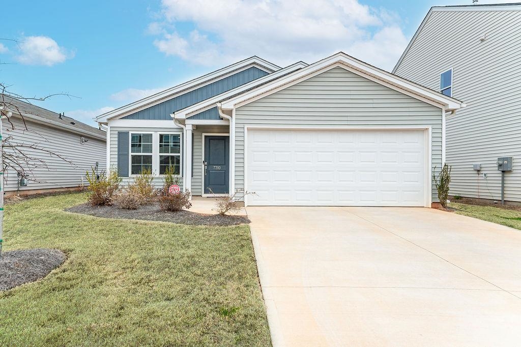 Price adjustment to $270,000. Move-In Ready | Better Than New | Prime Location Near Lake Bowen  Better than new and just over one year old, this meticulously maintained home offers comfort, style, and thoughtful upgrades throughout. Designed with an inviting open-concept layout, the spacious living area flows seamlessly into the kitchen and dining areas—perfect for everyday living and effortless entertaining.  Luxury vinyl plank flooring runs throughout the main living spaces, with carpet in Bedrooms 2 and 3 for added comfort. The beautifully appointed kitchen features upgraded cabinetry, quality quartz countertops, and enhanced sink hardware, combining modern style with everyday functionality. Quartz countertops continue into the bathrooms for a cohesive, high-end finish. The home also includes a refrigerator, washer, and dryer that are less than one year old—making this property truly move-in ready.  The primary suite offers a relaxing retreat with dual sinks, comfort height toilets in home, a garden tub perfect for soaking, and a subway tile shower. Additional upgrades such as detailed window casings and what is really special is the year round enclosed sunroom to enhance both style and convenience of the home.  Enjoy year-round natural light in the bright sunroom—an upgraded enclosed patio ideal for relaxing, working from home, or creating a flexible living space. A newly installed security system adds peace of mind.  Offering like-new condition without the wait for new construction, this home is an exceptional value in a convenient location close to shopping, dining, schools, and the beauty of Lake Bowen.  A must see!