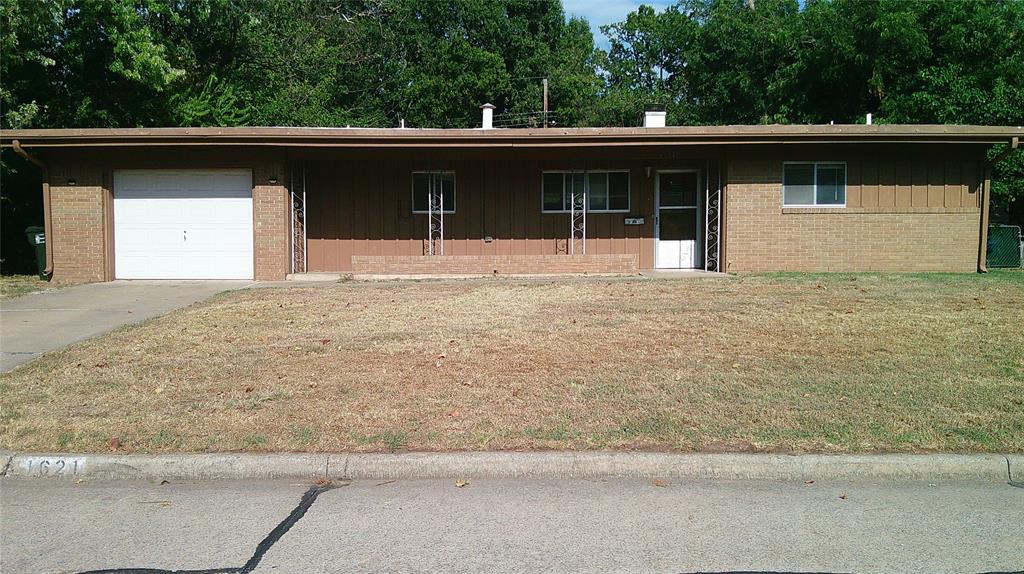 This home in a desirable neighborhood was originally set up for handicap accessibility.  The home offers lower kitchen counter tops, cooktop & oven .  Entry way has light panel that works the whole house.