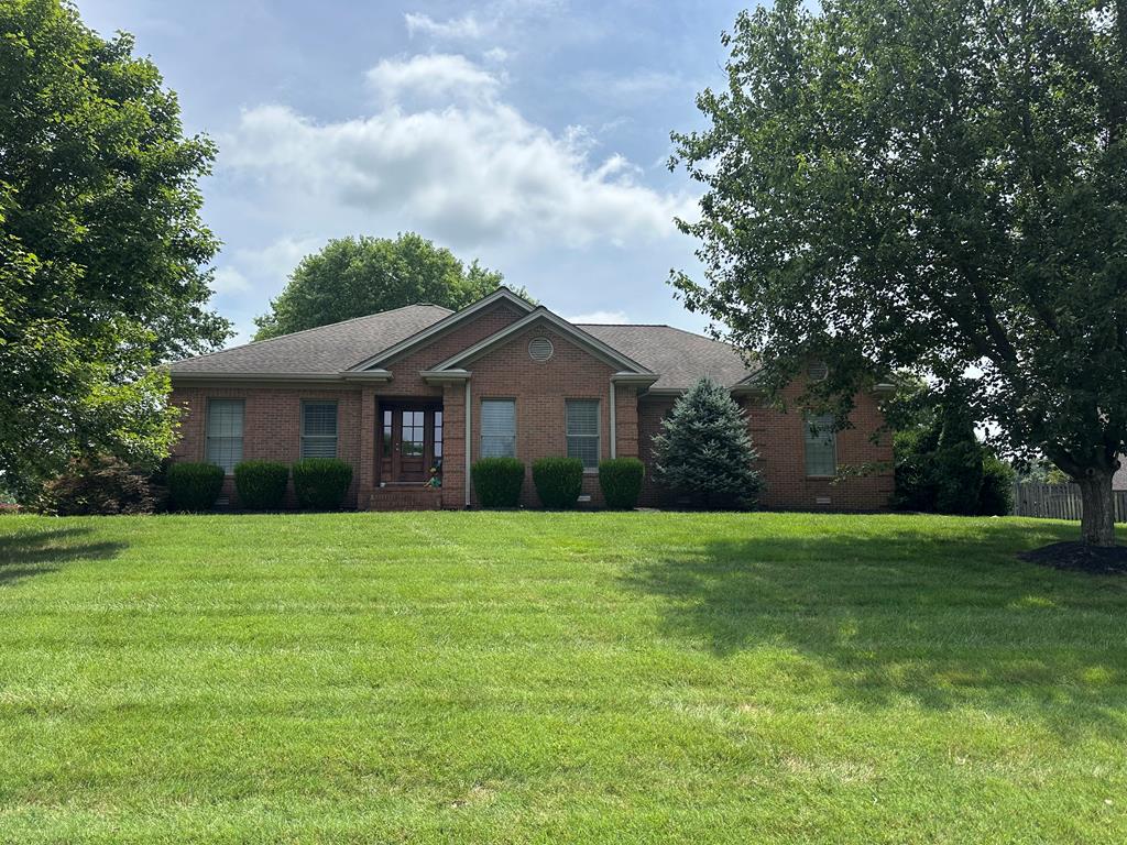 This beautifully updated brick residence offers timeless charm and modern luxury. Featuring hardwood floors, a fully remodeled kitchen (2024), and tastefully updated bathrooms. The spacious layout includes four bedrooms plus a dedicated office, a formal dining room, and a cozy living area with a fireplace. The finished upstairs provides versatile additional living space, perfect for a bonus room or guest retreat. Enjoy outdoor living with a fully fenced backyard, ideal for entertaining, and take advantage of extra driveway parking. A pantry and thoughtful storage complete this exceptional home. Situated on a desirable corner lot in a sought-after neighborhood, this property is the perfect blend of elegance, comfort, and convenience.