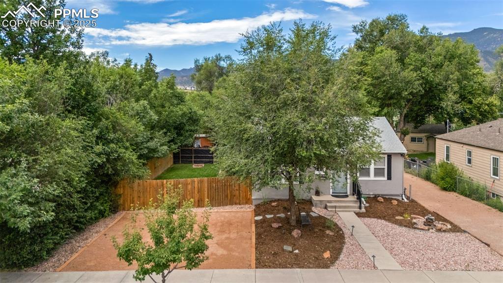 Discover this beautifully updated 2-bedroom, 1-bath home nestled in the heart of Old Colorado City. Located on an R2 lot, this property offers the rare opportunity to add an ADU—ideal for multi-generational living, rental income, or guest space. Even more, a separately deeded back lot is also available for purchase, allowing for an additional home and ADU to be built—an incredible investment opportunity.  Inside, you’ll find a thoughtfully renovated kitchen and bath, gleaming hardwood floors, and modern comforts including a new high-efficiency furnace, new A/C condenser, hot water heater, and new windows. All downspouts have been professionally buried, and the freshly landscaped yard is on drip lines for easy maintenance. Brand-new washer and dryer are included. Nicely landscaped and fenced back yard with firepit for outdoor entertaining. Minutes from downtown, Garden of the Gods, and the best of the West Side, this move-in-ready home blends character, comfort, and possibility.