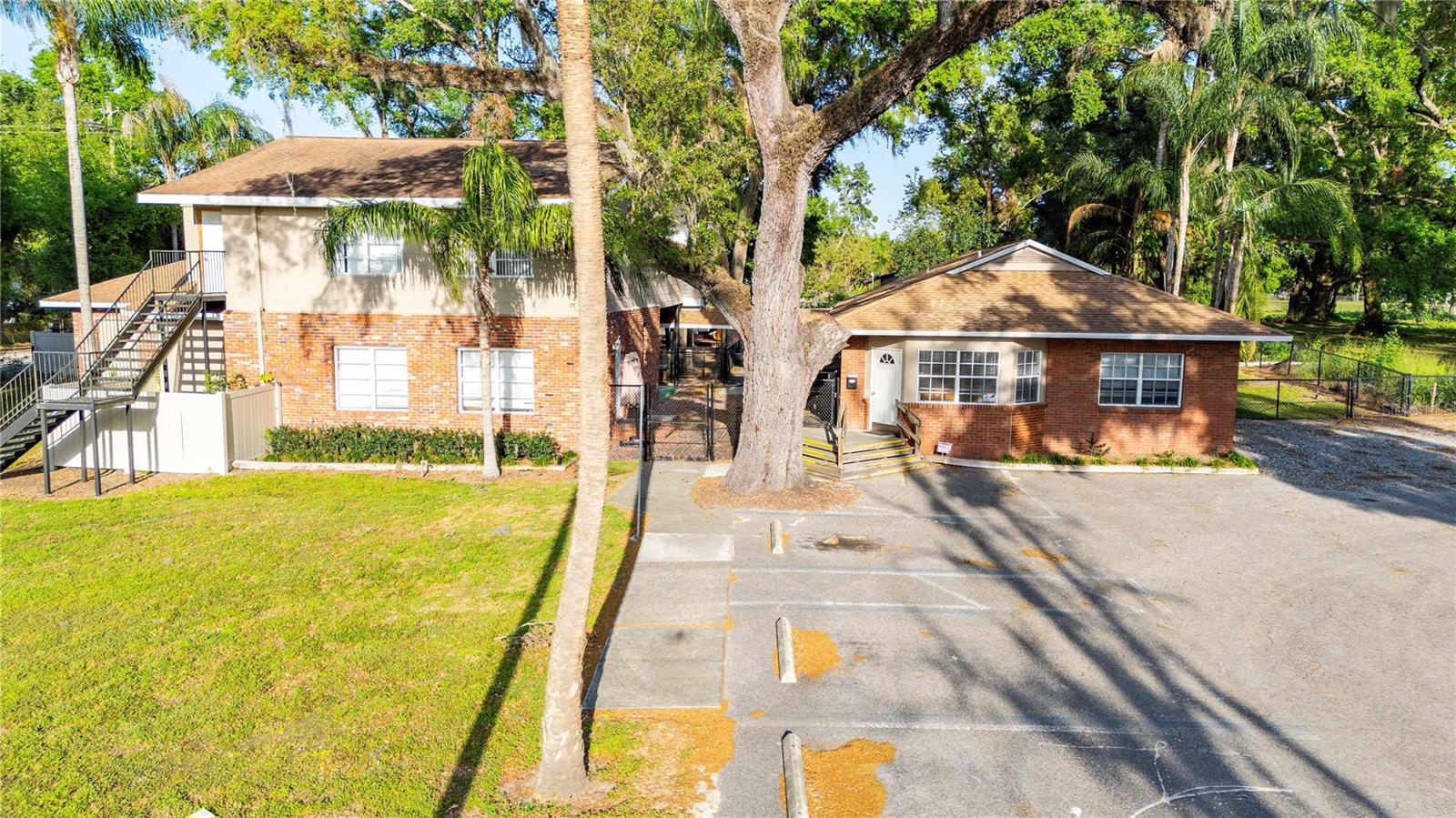 Discover this prime property located at US Hwy 98 and River Road in the growing city of Dade City, Florida.  This expansive 6,300 square foot building is ideally situated over two separate buildings with excellent access to River Road. This property offers a strategic location in the downtown area, catering perfectly to many opportunities.

The building boasts a versatile layout and was previously used as Child Care Center for 72 children. The two buildings boast two newer roofs, one in 2019 and one in 2020 and newer HVAC units.  A new drain field was installed in 2020, and the fire alarm system has been upgraded and recently certified.  The property also has a full commercial kitchen, equipped with an exhaust hood and Ansul system recently certified. Additionally, a Divinity Hill playground system (2020) as well as a basketball court and multiple improved outdoor areas finish the site.

This property presents an exceptional opportunity for businesses seeking to capitalize on the area's economic expansion. This facility promises both functionality and convenience in a highly desirable location.

Key Features:

Total Area: 6,377 square feet
Two Buildings on site, connected by walkway cover
Strategic Location along the US Hwy 98 Bypass (currently being widened)
Playground Equipment, Basketball Court
Full Commercial kitchen including hood and suppression
Ample Parking
Unlimited potential 

Don't miss out on this chance to secure a foothold in one of Florida's burgeoning markets. Contact us today to schedule a viewing and explore the potential this property holds for your business endeavors.