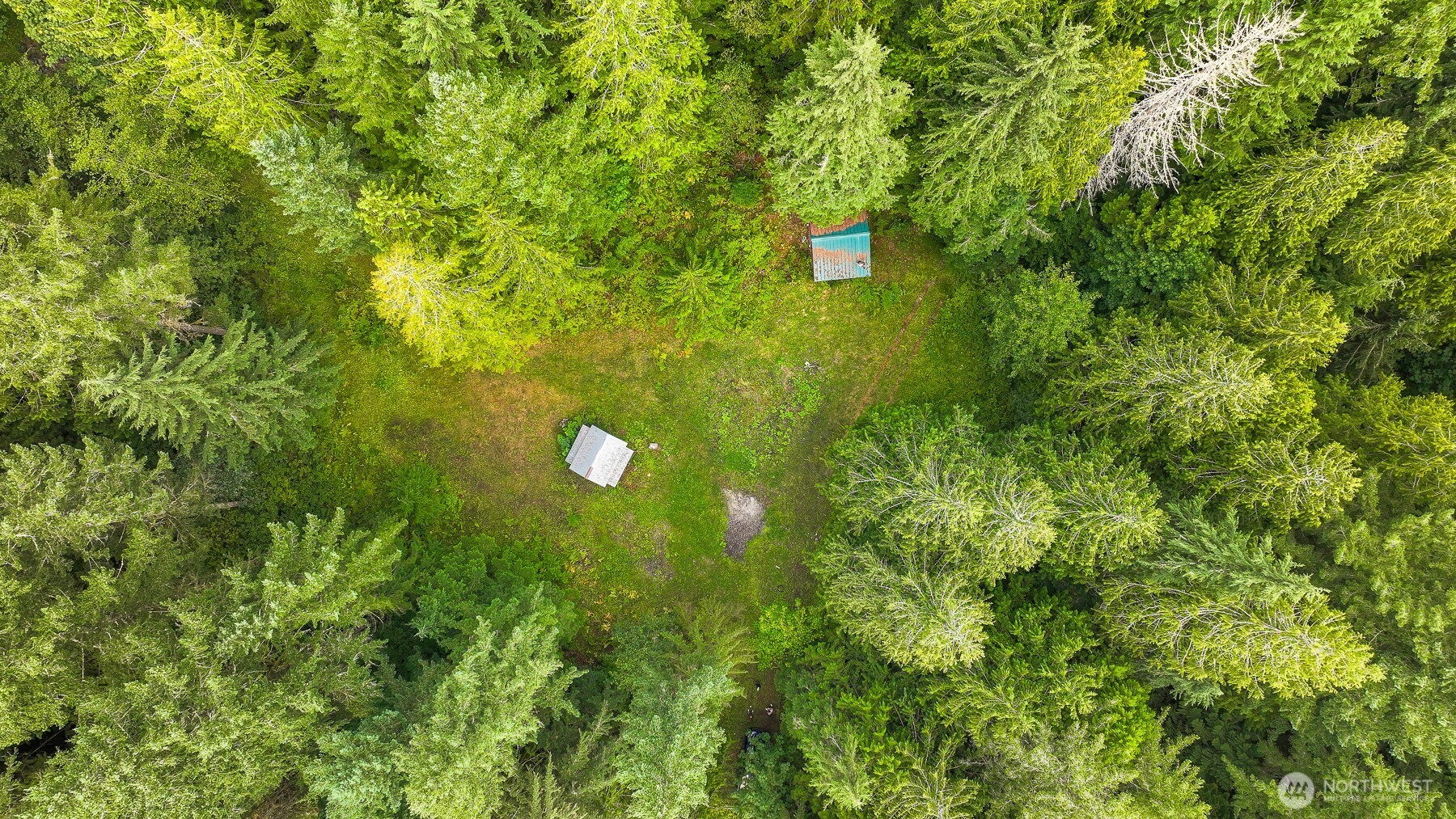 Prime 15-acre parcel Located a stones throw away from downtown Maple Falls. Zoned R5A with potential to subdivide into three 5-acre lots (buyer to verify). That's 3 parcels of land at $250k a piece! Front 5 Acres is cleared & Build-ready with private well & pump house, power connected, 3 Bed septic system installed. Cabin is gutted, ready to be restored & a pre existing manufactured home pad available with utility hookups near by, giving you an opportunity to live on property while you develop the rest. Marketable timber offers added value. Quiet, wooded setting 30 Min from Bellingham & 38 min to Mount Baker Ski Area. Ideal for Airbnb/nightly rental development, 3 separate homesteads or your own private estate. A must see!