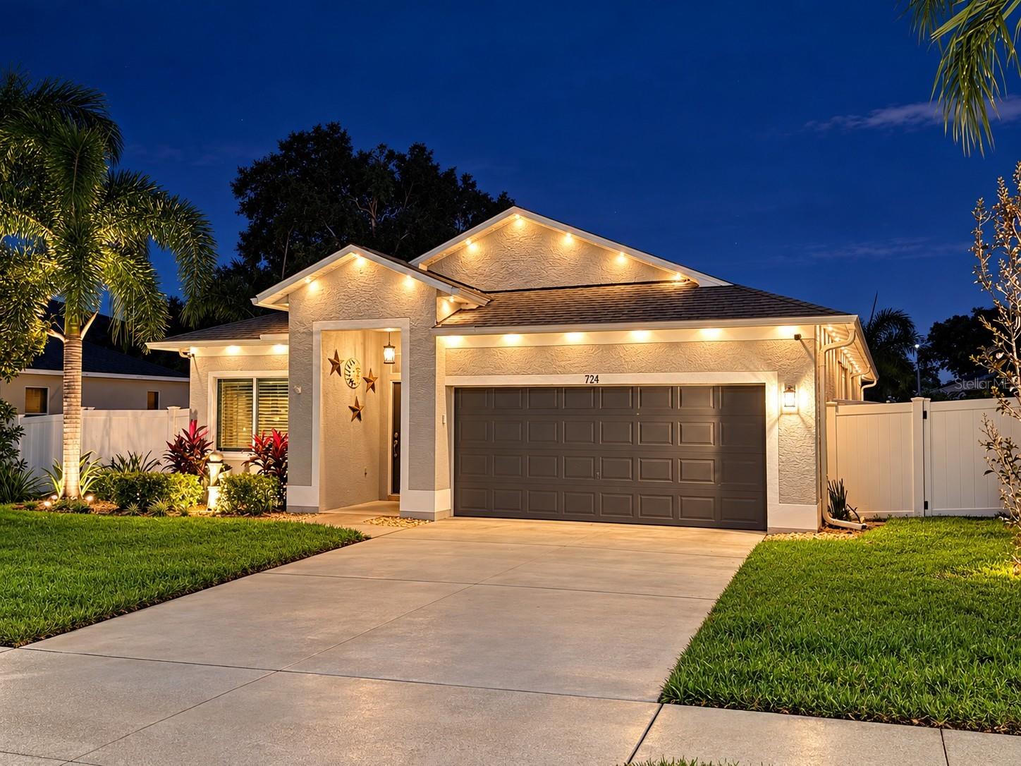 Welcome to 724 Sandy Hills, a beautifully updated and exceptionally well-maintained home with thoughtful improvements throughout. From the moment you arrive, the pride of ownership is evident in the lush landscaping, manicured grounds and extensive exterior accent lighting that gives the home striking curb appeal both day and night. Inside, the home offers a bright, open and comfortable layout designed for everyday living and entertaining.The custom kitchen and pantry provide excellent storage and functionality, while the remodeled bathrooms and custom walk-in primary closet add a polished, finished feel. An electric fireplace creates an inviting focal point in the living area, and the home has been carefully updated with both style and practicality in mind.Major improvements include a new roof installed in April 2024, along with newer impact windows and an impact front door installed in 2019. A newer water heater and two newer mini-split systems provide additional comfort and efficiency. The lanai and patio have been finished with porcelain tile, creating attractive outdoor living spaces that feel like a natural extension of the home.Additional features include wiring for a generator and Tesla/EV charging, providing valuable flexibility for today’s lifestyle. The landscaping has been beautifully maintained and thoughtfully illuminated, giving the property a finished appearance from every angle.This is a home where the updates have already been done and the details have been carefully considered, allowing the next owner to simply move in and enjoy.Close to all the Tampa Bay Area has to offer—championship golf courses, Tampa International Airport, world-class beaches, NHL, NFL and MLB events, the Grand Prix, PGA tournaments, fine dining, concerts, parks, biking trails and more. Begin Your Paradise Life Today.