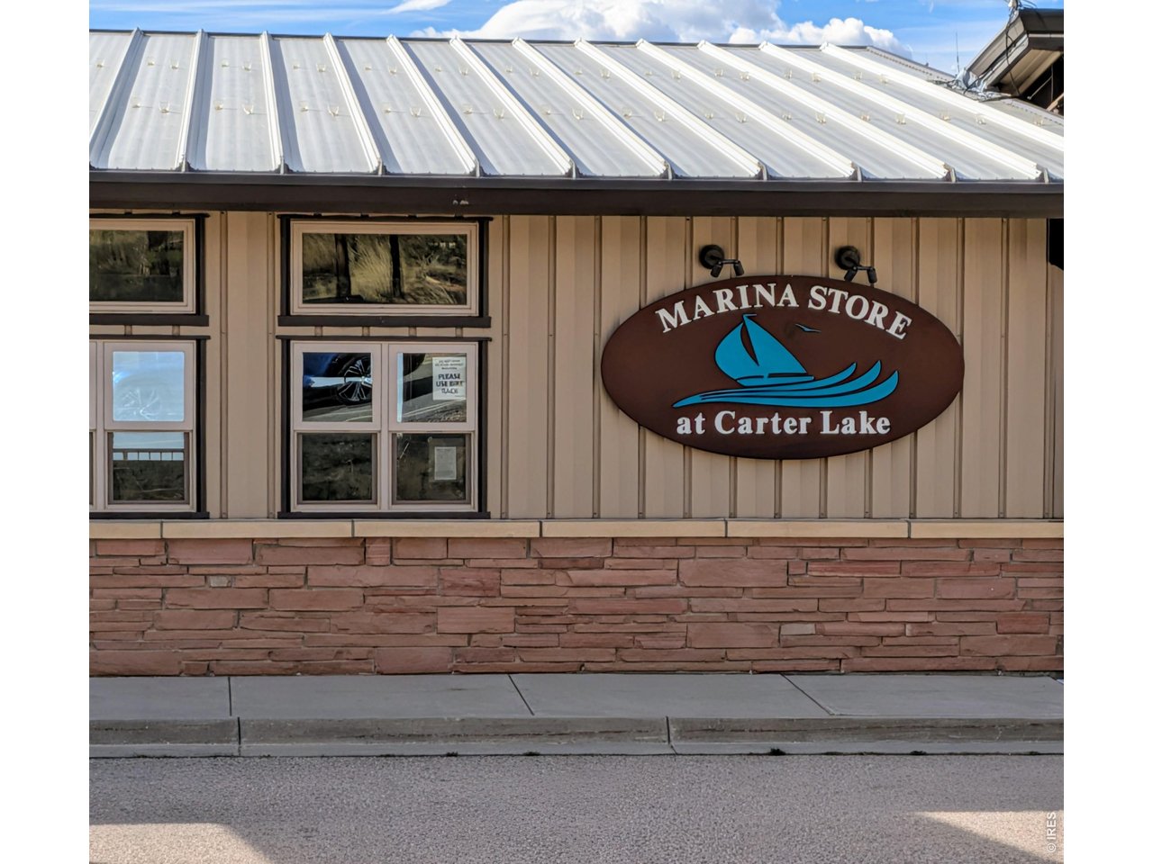 Welcome to your serene mountain retreat in the highly desirable Carter Lake community. Set on 1.7 acres of usable land, this charming 3-bedroom, 2-bath home blends peaceful rural living with close-in convenience. Built in 1989 and thoughtfully maintained, the property offers 2,184 sq ft of comfortable living space, wood floors throughout the main level, and expansive views in every direction. Bring your toys, tools, or horses-this property is designed for versatility. The acreage is open, usable, and ready for your vision. Enjoy mountain views, peaceful mornings, and the freedom of rural living while still being close to Loveland amenities. Best of all, you're walking distance to Carter Lake, offering boating, fishing, hiking, and year-round recreation.