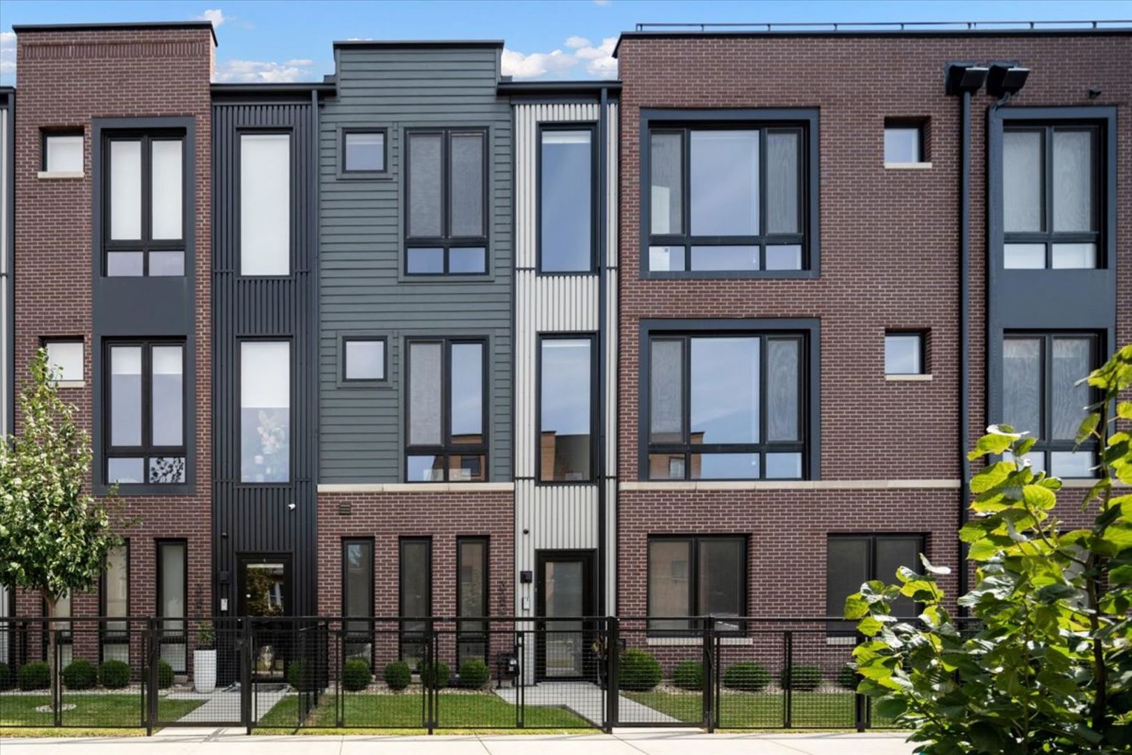Lives Like a Single-Family Home!  Introducing Avondale Reserve Townhomes, a new age development within one of Chicago's most historic and vibrant neighborhoods.  Developed by award-winning Noah Properties and designed by Lisek Interiors, this private, gated community features 52 upscale townhomes, thoughtfully designed for today's modern lifestyle. Each residence offers the space, privacy, and security of single-family living, complete with a private gated front yard, attached two car garage, and secure entry.  This 5-bedroom, 4.1-bathroom, 4,210 SF sun drenched home located on a tree-lined street features custom European cabinetry, chef-style kitchen with oversized island and stainless-steel appliances, custom build-outs, separate family room with wet bar, living room, and ding room with fireplace, spa-like baths, private rooftop deck and attached 2-car garage.  Just steps from your front door, homeowners can also enjoy amenities such as grilling stations and outdoor dining area, fenced in dog run, pet grooming shower, and an indoor fitness center outfitted with multiple 60" TVs, private changing rooms, weight & cardio equipment and more.  Move-In Ready.