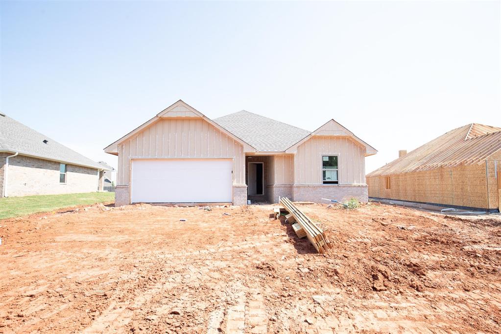 This Norma floor plan includes 1,425 Sqft of total living space, which includes 1,300 Sqft of indoor living and 125 Sqft of outdoor living space. There is also a 385 Sq Ft, two car garage with a storm shelter installed. This amazing and affordable home offers 3 bedrooms, 2 full bathrooms, 2 covered patios, and a utility room! The great room presents a 10-ft ceiling with large windows, wood-look tile, a ceiling fan, hand-textured walls, and Cat6 wiring. The spacious kitchen includes beautiful countertops, stainless-steel appliances, custom-built cabinets, wood-look tile, a large corner pantry, and a center island that holds a dishwasher and a roomy sink. The primary suite supports a high ceiling, lovely windows, a ceiling fan, Cat6 wiring, and our cozy carpet finish. The primary bath is attached and holds a dual sink vanity with an elegant countertop selection, satin nickel delta features, an elongated water saving toilet, and a spacious walk-in closet. Outdoor living includes fully sodded yards, a smart home irrigation system, and 30-yr weather wood shingles. Other amenities include a tankless water heater, R-15 insulation, a fresh air intake system, and so much MORE!