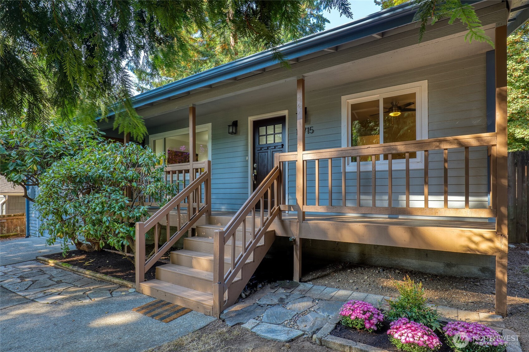 Tucked among towering cedars in the heart of Olympic Hills, this lovingly re-imagined 1951 home feels like a retreat from the city—without giving up the convenience of a Seattle address. All on one level, the comfortable, easy-flowing floor plan is filled with natural light from southern windows, enhanced by skylights and a sunny bay window in the kitchen. Each of the spaces are thoughtfully updated and exceptionally well maintained. Efficient mini-splits provide zoned heating and cooling year-round. Step outside to a generous fenced lot with front and back decks, mature landscaping and plenty of room to garden, play, and gaze up into the trees. An attached one-car garage offers abundant storage in addition to car. Quiet neighborhood streets await you outside, while light rail, transit and I-5 provide easy connections around the city. Nearby parks, the Burke-Gilman Trail, Lake Washington and an array of neighborhood restaurants and amenities put so much within easy reach. A sweet, comfortable home in a truly special setting—the kind of place that’s easy to settle into and hard to leave.