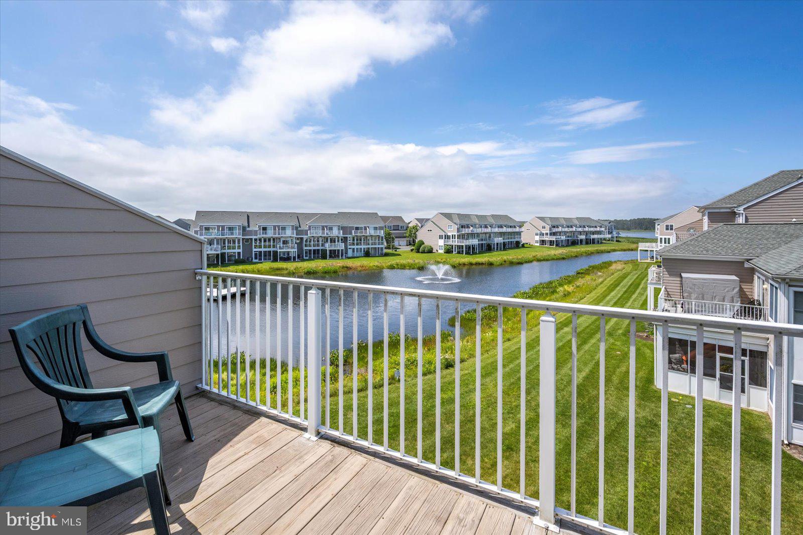 Incredible Opportunity at the New Price of $679,000 for 38277 Ocean Vista Dr #1180, a beautifully maintained fully furnished end unit townhome in the sought-after waterfront community of Bayville Shores in Selbyville, Delaware. Ideally located just 2.5 miles from Fenwick Island and minutes to Bethany Beach, Rehoboth Beach, Lewes, and Ocean City, MD, this Court Model offers over 2,650 sq. ft. of upgraded living space with a builder’s bump-out that enhances the open layout and natural light. As an end unit, it enjoys extra windows, added privacy, and unobstructed pond and bay views. The entry level features a spacious guest suite or second primary bedroom with a walk-in closet, en suite bath, and a bright waterfront sunroom perfect for a home office, den, or optional fourth bedroom. The main level showcases 9' ceilings, hardwood-style flooring, and a sun-filled kitchen with skylight, stainless steel appliances, abundant cabinetry, and bar seating. The dining area flows into the living room with gas fireplace and enclosed sunroom offering sweeping views of the pond and Little Assawoman Bay. Upstairs, the primary suite includes a walk-in closet, en suite bath with soaking tub and separate shower, and a private sundeck overlooking the water. A third bedroom with en suite bath and oversized closet completes the upper level. An attached garage provides extra storage, and the home is offered fully furnished with a stocked kitchen—ready for immediate enjoyment. Bayville Shores offers exclusive amenities for homeowners, renters, and guests secured via key fob access. Enjoy an Olympic-sized swimming pool, baby pool, sun deck, and centrally located Community Center with restrooms, showers, and on-site management. The second-floor fitness center includes cardio equipment, free weights, a Pilates bar, TV, kitchen, and community library with stunning pond views. Nature lovers will appreciate three freshwater fishing ponds (catch-and-release), three piers, and a private boat ramp with access to Dirickson Creek and Little Assawoman Bay. Kayak racks are available for seasonal rental, and a private boat storage facility accommodates vessels up to 30 feet. For recreation, there’s a full-sized basketball court, tennis court, four pickleball courts, shuffleboard, horseshoe pits, a sand volleyball court, and a playground. Scenic walking and biking paths wind throughout the neighborhood, with pondfront gazebos, a community post office, and golf cart-friendly roads. Water is included—so you’ll never receive a water bill—and the home is connected to public sewer. Enjoy low electric rates through Delaware Electric Cooperative. The HOA also covers all exterior maintenance plus flood and hazard insurance for low-maintenance ownership. Bayville Shores is partially solar powered, with panels generating over 1.5 million kWh of energy over 30 years. Short-term rentals are permitted, making this a high-performing investment property in a prime coastal location. With beautiful pond and bay views, spacious living, and unmatched community amenities, this turnkey home offers the best of coastal Delaware living.
