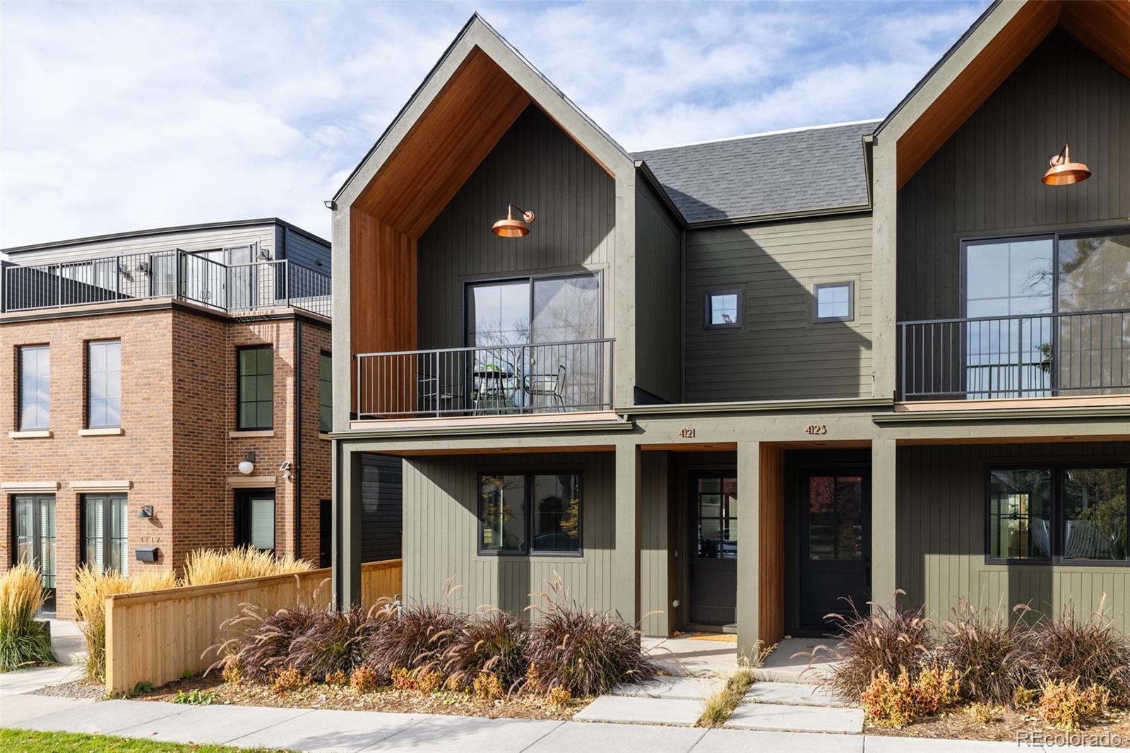 Distinctive design, refined craftsmanship, and exceptional attention to detail define this newly completed residence in the heart of Sunnyside. Five years in the making, this custom home showcases a one-of-a-kind floor plan designed for the way people live today. The extraordinary chef’s kitchen features paneled Thermador appliances and bespoke Tharp cabinetry, setting the stage for memorable meals and culinary creativity. The adjacent dining room provides an elegant setting for gatherings large or small, while the comfortable living room seamlessly connects to the expansive backyard through custom glass double sliders—perfect for enjoying Colorado’s beautiful days and evenings from the covered patio. A thoughtfully designed mudroom keeps everyday gear neatly organized and out of sight. Upstairs, you’ll find three generous bedrooms and two beautifully finished bathrooms, including a serene primary suite with vaulted ceiling, private balcony, large walk-in closet, and a spa-like five-piece bath. The third level offers a flexible retreat ideal for a home office, gym, media room, or art studio—complete with a dry bar, private bath, and peaceful rooftop patio for fresh air and inspiration. The full basement adds even more living space, with a cozy media area ideal for movie nights or game-day celebrations, along with a stylish guest suite that ensures comfort and privacy for visitors. A two-car garage with a custom storage loft provides additional functionality rarely found in the city. Located just blocks from Sunnyside’s premier dining and shopping destinations, this home also offers effortless access to LoHi, I-25, I-70, and downtown Denver—placing all of Colorado’s best experiences within easy reach. A one-year builder warranty offers added peace of mind. The Quivas Block represents a curated collection of 8 custom homes, designed by 3 different architects under the unified direction of Qualitas Homes. This is contemporary Denver living at its finest. Welcome home.