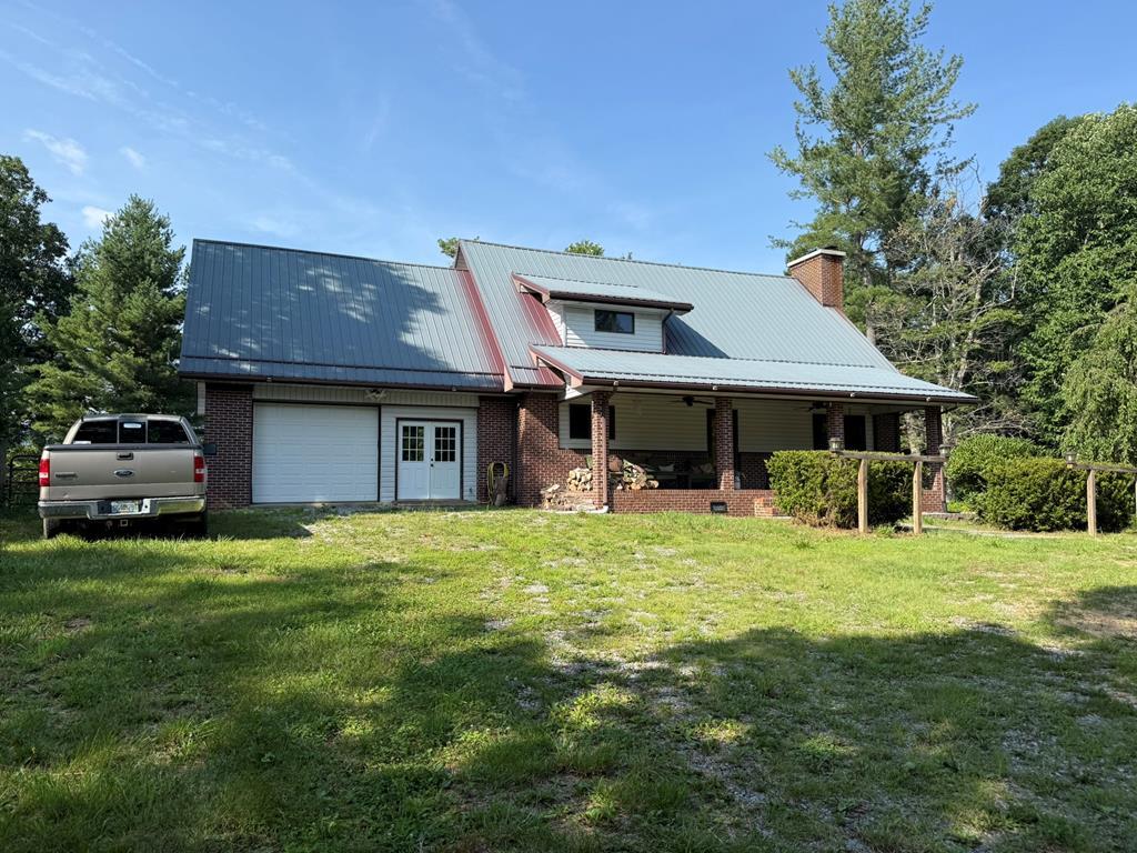 If you're looking for privacy and a quiet setting in a convenient location, this is the one for you! This beautiful home sits in a picturesque location in Elk Creek with easy access to both Independence and Wytheville. Situated on 9 acres of mostly wooded land, this 3 bed/3 bath home offers space for a growing family or room to spread out for empty nesters. Located in close proximity to local tourist destinations and a popular event venue, this home also has potential as a short-term rental.