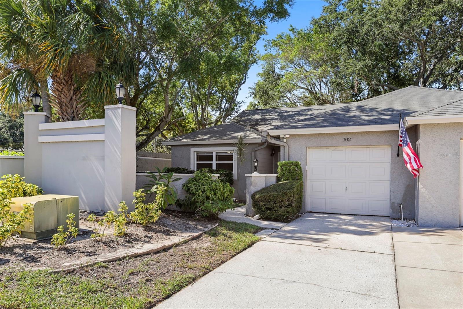 Welcome to this charming end-unit villa featuring 2 spacious bedrooms, 2 full bathrooms, and a convenient 1-car garage. This well-maintained home offers a thoughtful layout with abundant storage throughout, including built-in closets in both bedrooms. The primary bedroom boasts an ensuite bathroom with a tub/shower combo and a skylight that fills the space with natural light. Enjoy the ease of having a washer and dryer in the garage, along with plenty of extra storage space. Step outside to the screened lanai, perfect for relaxing or entertaining, with access from the dining room, kitchen, and primary bedroom. Some notable updates include a Genie garage door opener with keypad, LeafFilter gutters at the front entry, a high-efficiency Lennox 16.8 SEER HVAC system with a transferable warranty that was installed in 2023 plus additional insulation was added in 2022 for improved energy efficiency.  The roof was replaced in 2016 with hurricane clips for added protection.  The community features a beautiful pool along with tennis and pickleball courts for residents to enjoy.  This bright and comfortable villa is a rare find- especially with the low monthly association fee-schedule your showing today!
