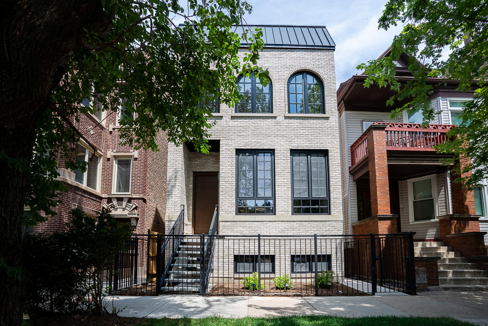 Welcome to 3446 Oakley Ave , a remarkable new construction home located in the heart of Roscoe Village. This modern, three-story residence offers 4,200 sq. ft. of thoughtfully designed living space, featuring 6 spacious bedrooms and 5 and half bathrooms. Crafted with luxurious, top-of-the-line finishes, the home combines elegance and functionality for a contemporary lifestyle. The chef's kitchen is a true standout, equipped with state-of-the-art Sub-Zero and Wolf appliances, a built-in coffee system, a large island, and dual walk-in pantries. The open layout flows seamlessly into bright, expansive living areas that are perfect for both entertaining and relaxing. Upstairs, enjoy a rooftop deck spanning over 1,000 square feet, offering sweeping views and an ideal setting for outdoor gatherings. Just off the family room, a terrace patio extends the living space outdoors. The fully finished basement includes a spacious recreational area, a custom wine room, a wet bar with fridge and a separate laundry room a with dedicated dog shower. Designed with comfort, style, and convenience in mind, this home delivers on every level. Situated just steps from, top-rated schools Audubon, Bell, Lane Tech & DePaul prep, parks, restaurants, and boutique shops, this is a rare opportunity to own a true masterpiece in one of Chicago's most desirable neighborhoods.