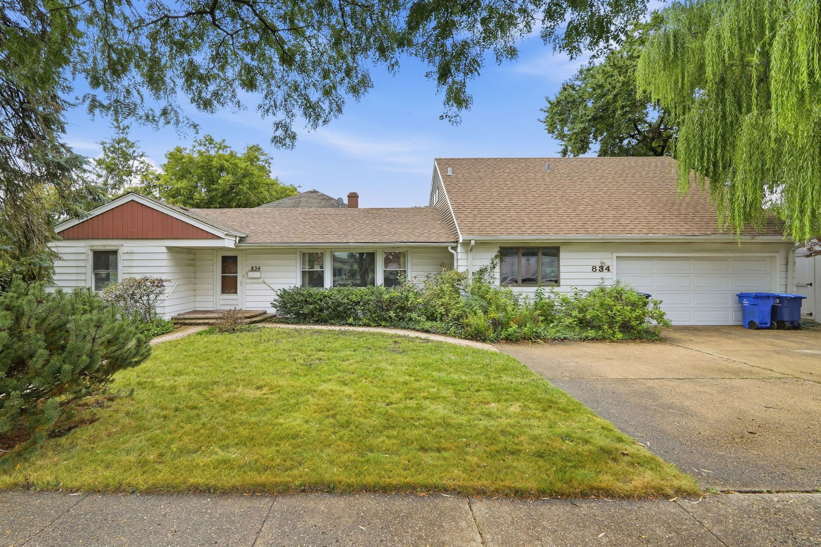 Welcome to this beautifully refreshed home in Des Plaines! Located on an extra large corner lot, this home has 4 bedrooms, 2 full bathrooms, and 2 half bathrooms. The main level features refinished hardwood floors in the living room and the bedrooms, brand new engineered hardwood in the family room, and is freshly painted throughout. The spacious and bright finished attic is a standout feature, offering a versatile flex space with its own half bath. It would be great as a playroom, office, guest space, home gym, or anything your lifestyle requires! The attached 2 car garage is an added convenience, along with the driveway that could accommodate 4 additional cars. Outside, enjoy lush mature landscaping along with a gorgeous willow tree, a large deck, porch swing, and shed for additional storage. Located near the expressway and within walking distance of the Prairie Lakes Community Center where you can workout, swim, play pickleball, enjoy the playground, ride along the bike path, or just surround yourself within nature, this home offers flexibility, comfort, extensive updates, and plenty of room to live and grow!