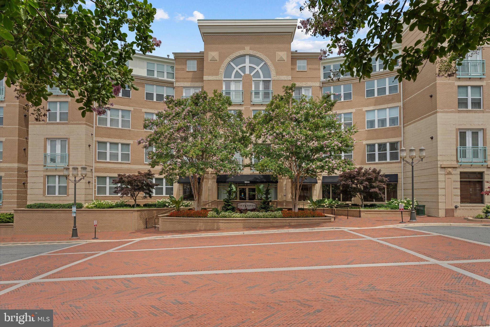 This home is a 2 level loft condo in the beautiful community of The Savoy at Reston Town Center. The "Chigale Loft" is a rare find in the community. The open floor plan offers vaulted ceilings/sky lights/private balcony that overlooks the courtyard. Flooring was recently replaced.... newly updated granite and white back splash for a luxurious addition to this amazing space. New AC 2025. The large upper-level loft area is great multi-functional space that could be used for office space/workout space/den or a non-legal bedroom. Additional closet storage in loft area. A large laundry area with full washer and dryer. The location of the Savoy at Reston Town center is within close distance to theaters, restaurants & shopping. Minutes to the Silver line Metro.