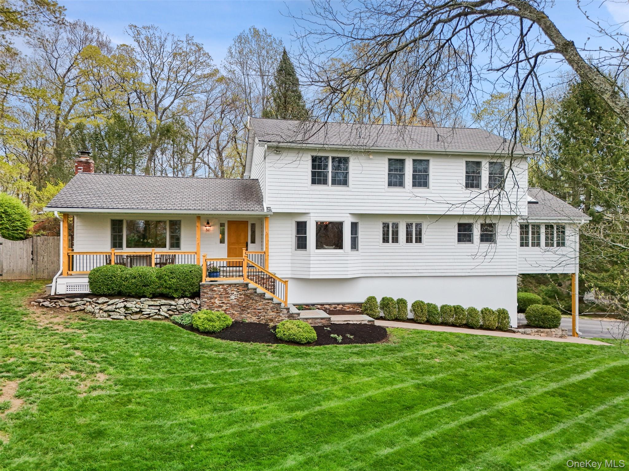 Turn-Key Classic Colonial with extensive renovations and improvements. The current owners have continued with a series of updates. Open and fluid design for entertaining with light and sunny interior spaces. Beautifully proportioned rooms complimented by crown moldings. Thoughtfully designed Chef's Kitchen with custom cabinetry, center island with wood cap, quartz counters, and a large Breakfast Area with built-in window seat. Open and airy Sunroom featuring vaulted ceiling beams, fan, and skylights. Private 2.15 acres with sunset views of the Pound Ridge Reservation with in-ground pool perfect for outdoor entertaining.