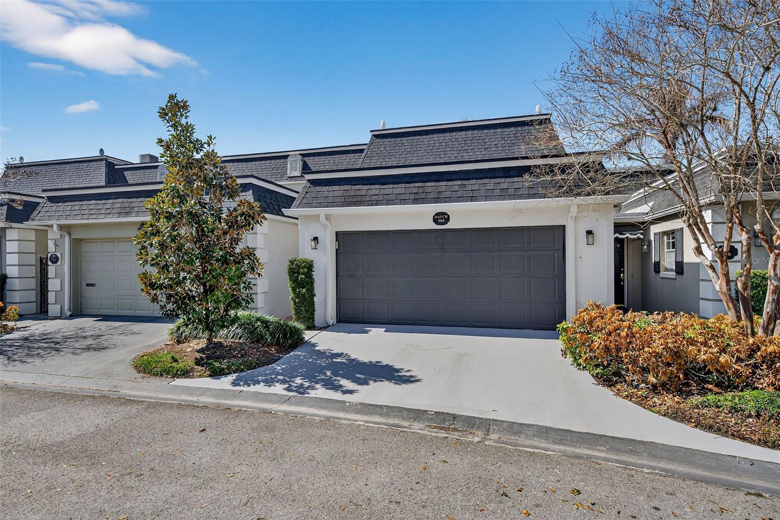 Come see this NEWLY (2025-2026) renovated condominium in the desired Country Club Townhouse Estates! 908 Hillary Court is a newly updated 2 bedroom, 2.5 bath condo with MANY new features including new plumbing, new electrical, new floors, new AC, appliances etc!  This unit features a large family room and brand new modern kitchen with quartz counters and new cabinets. Other features include a 2 car garage, downstairs half bath, inside laundry area and front/back outdoor spaces.   Upstairs features new carpet in the bedrooms and 2 completely renovated bathrooms.  The primary bedroom has a walk in closet and en-suite bathroom with all new everything!  This condo is located on a quiet cul-se-sac with the community pool at the end of the street.  Excellent location near downtown Orlando, College Park and the Packing District.  Come see this completely renovated home!  You will not be disappointed!