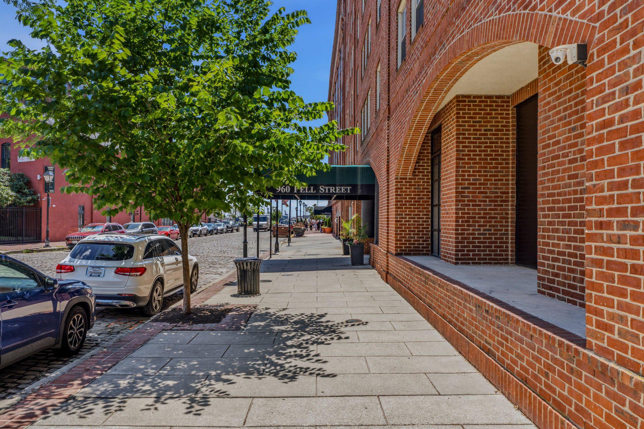 Welcome to Belt’s Landing, ideally situated on one of Historic Fells Point’s charming cobblestone streets! This sought-after waterfront community offers exceptional amenities including a 24-hour front desk, two community EV garage spaces, exercise room, outdoor pool with stunning water views.This 2-bedroom, 2-bath condo features gleaming wood floors throughout, an updated kitchen with granite countertops, stainless steel appliances, and the rare convenience of TWO-CAR PARKING. The spacious primary suite offers a walk-in closet and a private bath with double sink vanity, separate soaking tub, and shower. The second bedroom and full bath provide the perfect setup for guests, family, or roommates.Enjoy the very best of city living with Fells Point’s local shops, renowned restaurants, waterfront attractions, expansive waterfront Promenade and vibrant nightlife just steps from your door!