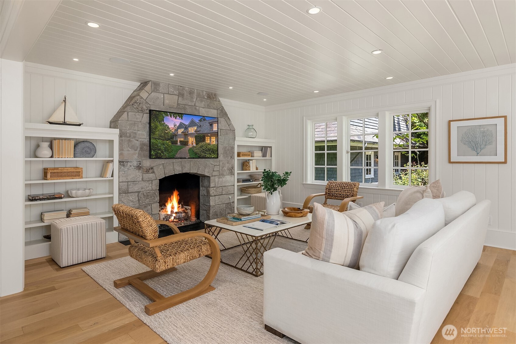 Inviting living space anchored by a fireplace.