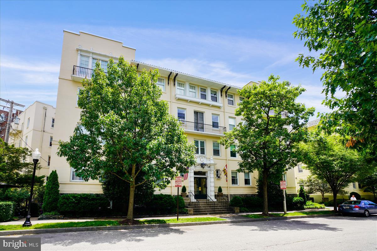 Rarely available three bedroom, two bathroom corner unit at the Geneva! Located adjacent to the Johns Hopkins University Homewood Campus and just around the corner from the Baltimore Museum of Art, the Geneva, an elevator building, is one of the most sought after boutique condo buildings in the Guilford community. Enter a designer finished unit with handsome details, faux painting, and custom woodwork throughout. A formal foyer is flanked by a dining room with custom built-ins and and an oversized living room with fireplace. An updated kitchen with a large walk-in pantry is also home to an in-unit stacked washer & dryer. The condo comes equipped with updated HVAC and has tons of natural light! Easy commute to Penn Station, downtown Baltimore, or north to the county. Vibrant, lively neighborhood with shops, restaurants, and coffee shops galore- all right outside your building's door. Beautiful shared garden & patio areas. Pets allowed. On street permitted parking. Storage locker in lower level for extra storage. Welcome home to easy living!