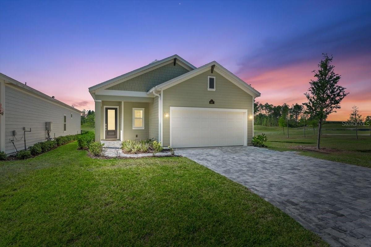 Lifestyle and Location! LIVE the Florida dream that your friends will envy. This home has one of the best lots in the neighborhood with no other home on the side, preserve across the street and so close to the wonderful amenities! Located on the signature Hole #6 on this pristine Bobby Weed golf course, the golf views are stunning. Walk or ride your golf cart the very short distance to the resort like pool, pickleball courts, TopTracer and brand new breathtaking clubhouse. This Lennar Alexia floor plan is the perfect empty nester home. Entertain your guests in this open kitchen with large island and many cabinets for storage. The spacious family room and master bedroom overlook the gorgeous water golf and nature views. Enjoy your morning coffee or evening glass of wine relaxing on the screened lanai watching the beautiful views. Don't miss this one of a kind opportunity!