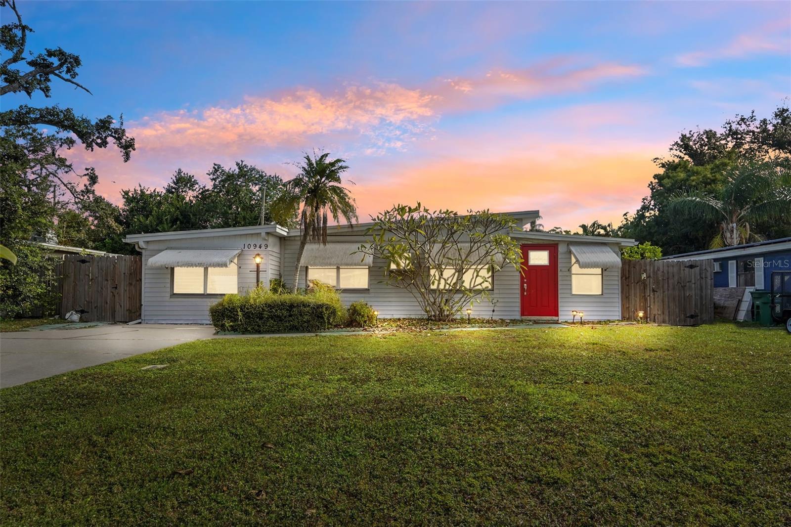 One of the best value, LOWEST price per sq ft in the area. This solid block 3-bed, 1-bath property packs incredible potential and peace of mind with NO lender-required flood insurance (Evacuation Zone C). Major updates are already handled for you: 2019 A/C, updated electric panel, 2022 tankless water heater, and a newly re-screened back porch that instantly adds usable living space.You’ll love the oversized double driveway—room for four cars, plus two storage sheds ideal for your tools, beach gear, or lawn equipment. The 60x102 lot gives you the space everyone wants in Pinellas—ample room to add a pool and still enjoy your yard. A shallow well and pump keep your landscaping green without running up your water bill.Location is a huge win here: 10 minutes to the beach, steps from restaurants, shopping, the Pinellas Trail, Walsingham Park, Florida Botanical Gardens, and everything that makes this area so special.