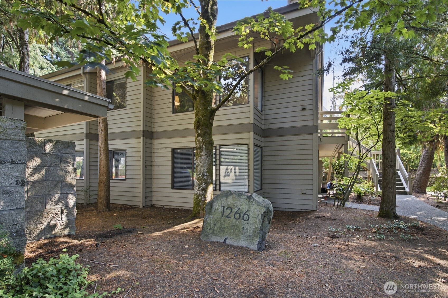 Prime Bellevue living in an unbeatable location! This beautifully updated 1-bedroom, 1-bath condo offers a functional floor plan and the perfect combination of convenience, comfort, and investment potential. The kitchen and bathroom have both been tastefully updated, creating a fresh, move-in-ready home. Enjoy being just minutes from Bellevue Square, with an incredible selection of restaurants, shopping, entertainment, and everyday conveniences right at your doorstep. Located in the highly sought-after Bellevue School District, yet tucked into a quiet and peaceful neighborhood that feels removed from the energy of downtown. Enjoy great community amenities, including a swimming pool, one designated parking space, and ample visitor parking. The community also features a reasonable HOA with healthy reserve funding, offering added peace of mind for the next owner. With no rental cap, this is an excellent opportunity for both homeowners and investors. A rare chance to enjoy the best of central Bellevue—exceptional location, great schools, a peaceful setting, and everything you need just moments away.