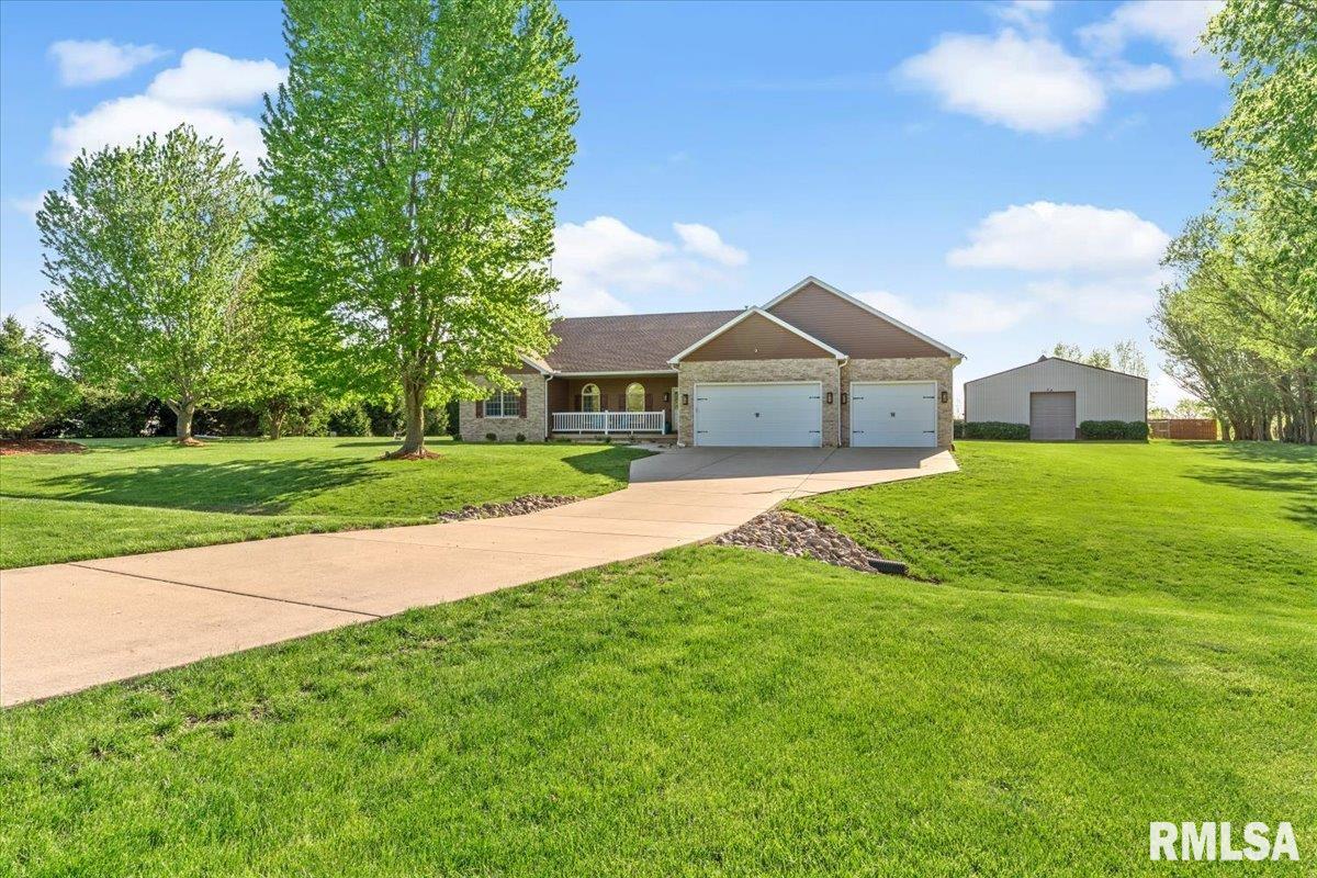 COMING SOON AND AVAILABLE FOR SHOWINGS ON 4-22-26. Quiet cul-de-sac living meets country lifestyle in this spacious 5-bedroom, 3 bath home on 2+ acres in the highly desirable Pleasant Plains School District. The main floor includes 3 bedrooms, including the primary suite with walk-in closet and private bath with tub and shower, an additional bath near the two main floor secondary bedrooms, kitchen, living room, dining area, main floor laundry, large foyer, and a flexible room ideal for an office, sitting room, or playroom. The lower level offers new carpet throughout and a 4th bedroom w/egress, and 5th bedroom/office without egress, 3rd full bath, large family room, and abundant unfinished storage. Fresh neutral paint welcomes you inside, and the eat-in kitchen opens to a cozy screened-in patio overlooking the stamped concrete patio, large backyard, fruit trees, and updated landscaping.The property features flat, usable land with a 50’ x 65’ Morton outbuilding w/concrete floor, large overhead door, water, electricity, and ethernet — ideal for a workshop, storage, RV, or boat. Additional outdoor features include a fenced dog run directly off the rear door of the attached garage, fenced chicken/animal area, and 11 fruit trees with deer fencing. available High-speed Starlink internet (~430 Mbps), a 500-gallon owned underground propane tank, and gas lines present for dryer and stove for versatility. Call your favorite Realtor right away to schedule a tour of this amazing home!