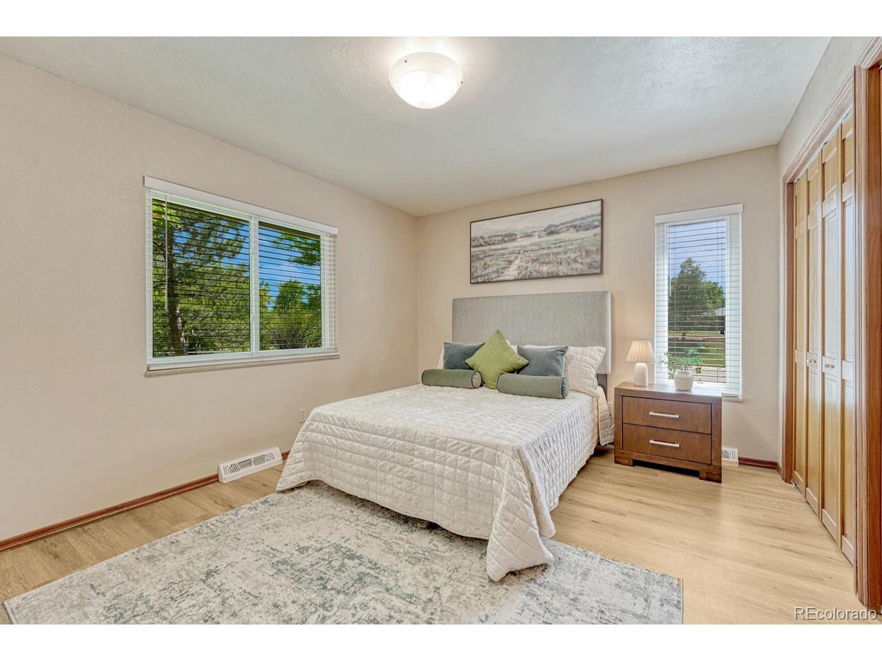 Welcome to this spacious and beautifully updated 5-bedroom, 3-bathroom home in the highly sought-after Hutchinson Hills neighborhood, situated on a quiet cul-de-sac. Location truly shines here-just minutes from I-25, shopping, dining, and entertainment. Bible Park is directly across the street - easy access to walking/biking trails, picnic areas, wildlife viewing, and endless outdoor recreation. The main level showcases new luxury vinyl flooring (5/2025), a family room, formal dining area, and a cozy hearth room featuring a wood-burning fireplace. The updated kitchen is designed for both everyday living and entertaining, offering granite countertops, a gas stove, an island, and all appliances included. The primary suite features a private three-quarter bath, while two additional bedrooms and a full bathroom complete the main level. The finished basement provides an exceptional additional living space with 2 bedrooms, a large family room, a three-quarter bathroom, storage and a spacious laundry room with utility sink (washer and dryer are included). Step outside to a private backyard retreat featuring a covered patio, fully fenced yard, mature trees that provide outstanding privacy, shade, and energy efficiency, a Tuff storage shed, 2 Car attached garage and a RV driveway. Major Updates Include: New driveway, patio, and sidewalks (4/2019) New gutters (4/2023) New roof with Class 4 impact-resistant shingles (4/2023) New Exterior Paint (4/2023) New basement lighting (4/2024) New luxury vinyl flooring on main level (5/2025) New basement carpet (5/2026) New west garage door opener (12/2024) New east garage door spring (2/2026) Garage walls painted (3/2026) Additional features include dimmer switches throughout much of the home and a convenient dog door. This move-in-ready home combines thoughtful updates, abundant living space, an unbeatable location, and the freedom of no HOA-making it a rare opportunity in one of Denver's most desirable neighborhoods.