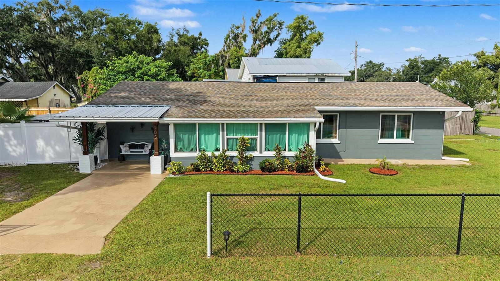 CORNER LOT • NO HOA • NO CDD • FLOOD ZONE X! This well-maintained 3-bedroom, 2-bath home offers 1,368 sq. ft. of heated living space in an established Plant City neighborhood. Recently painted inside and out, the home features an updated kitchen and bathrooms, plus valuable updates to the roof, A/C, plumbing, electrical system and panel, along with many updated windows. Tile flooring throughout, interior laundry, a fully fenced yard, storage shed and rain gutters add comfort and functionality.The spacious primary bedroom features a private bathroom and kitchenette area, creating a flexible space ideal for extended family, guests, or additional privacy.Conveniently located near Downtown Plant City, shopping, dining and major roadways, with easy access to Tampa and surrounding areas. Move-in ready with valuable updates and a versatile layout—schedule your private showing today!