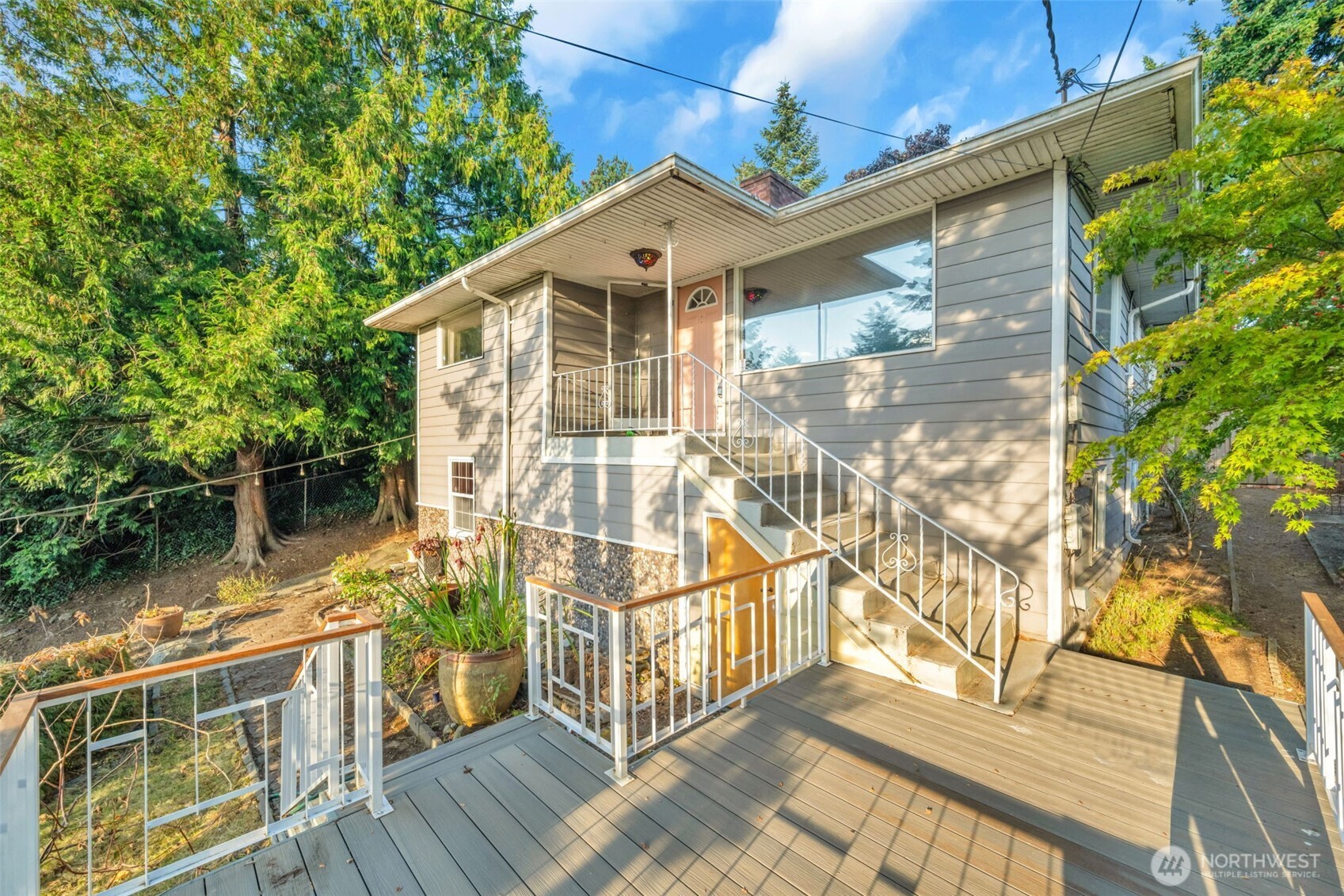 Here is your chance to make this one truly your own! This livable “diamond in the rough” offers 4 bedrooms, 2 bathrooms, and plenty of flexibility for your needs. Enjoy wood-burning fireplaces on both levels, plus the potential for a second kitchen. The home is already configured with separate entrances and laundry on each floor. This offers exciting possibilities for multigenerational living, rental income, or additional living space. Dreaming of an urban farm? This property is already set up for chickens. After a day of projects, unwind in the delightful hot tub. Improvements include new siding along with electrical and plumbing. Conveniently located near Westwood Village and White Center. Easy access to major freeways and public transportation. This property offers a great combination of location, opportunity and potential. Bring your vision and create perfection!