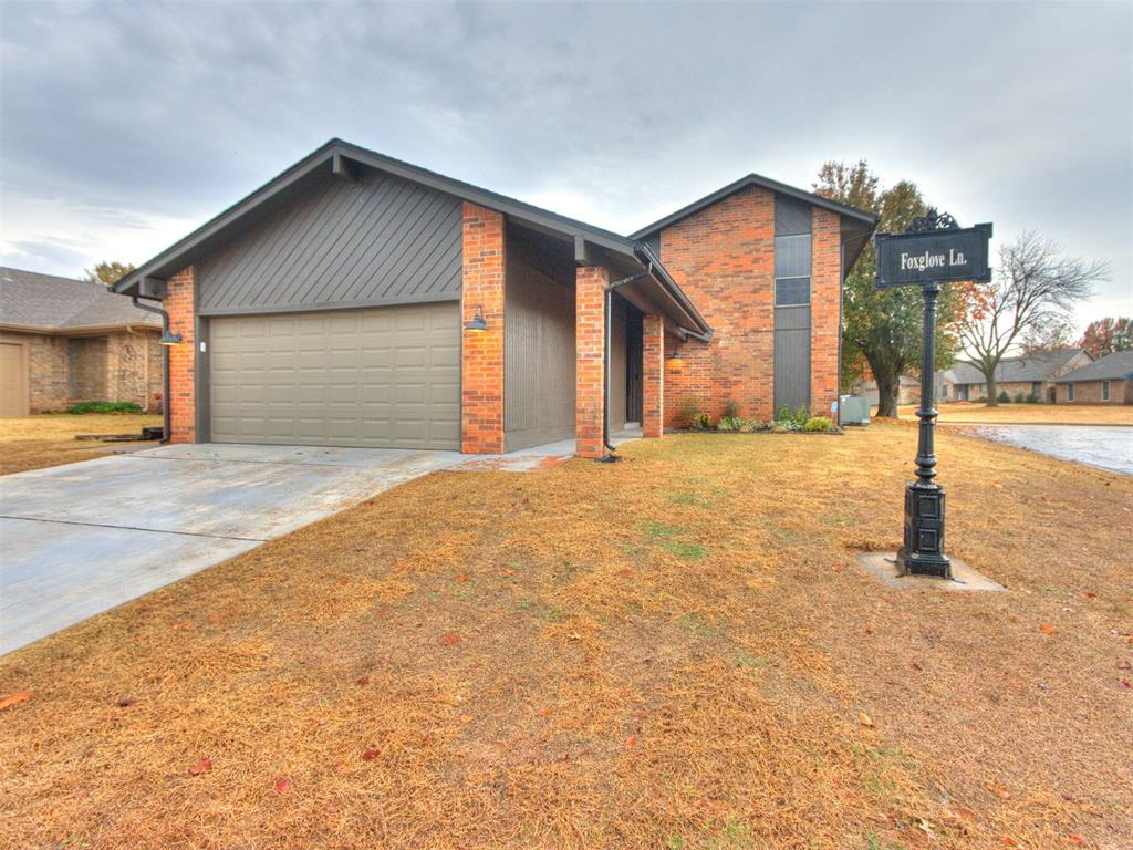Welcome home!  This gorgeous home on a corner lot has been almost completely remodeled inside and out!  Once arriving you'll find great curb appeal on this corner lot with new landscaping and light fixtures, fresh exterior paint, and a new roof and gutters that were installed in 2023.  Step inside to find so many updates...new paint (including walls, doors, and baseboards) and custom blinds throughout, new light fixtures and fans, door hardware, and new luxury vinyl plank floors.  Tons of natural light flood this open concept floor plan.  Spacious living room with gas fireplace and vaulted ceiling with a rustic wood beam.  Nicely appointed kitchen features new cabinets with soft close and hidden drawers for added storage, tile backsplash, a built in pantry, a kitchen faucet with 3 settings including rainfall, and hidden fans in the light fixtures.  Cute half bath off the living room.  The primary suite is also nestled downstairs and features an updated bathroom with a new vanity, mirrors, toilet, and tile tub/shower combo with an extra deep soaking tub plus 2 separate closets, and a linen closet.  Cute half bath hidden downstairs off the open living area for guests.  The stunning staircase leads you upstairs with a new stair rail and treads.  Upstairs you'll find two more spacious bedrooms and a hall bath.  The yard offers an open patio off the living room and a covered side patio with access from the kitchen.  Other new features include a new water heater, new decking and insulation in the attic, a keyless front door lock, and a smart thermostat.  There is also a storm shelter in the garage floor.  This wonderful neighborhood includes 3 swimming pools...one is just steps away from your home!  The beautiful walking trails at Bluff Creek Park are just a few blocks away.  Amazing location within minutes of tons of restaurants and shopping, medical facilities, the Kilpatrick Turnpike, the Hefner Parkway, and so much more!  This one won't last long so don't hesitate!