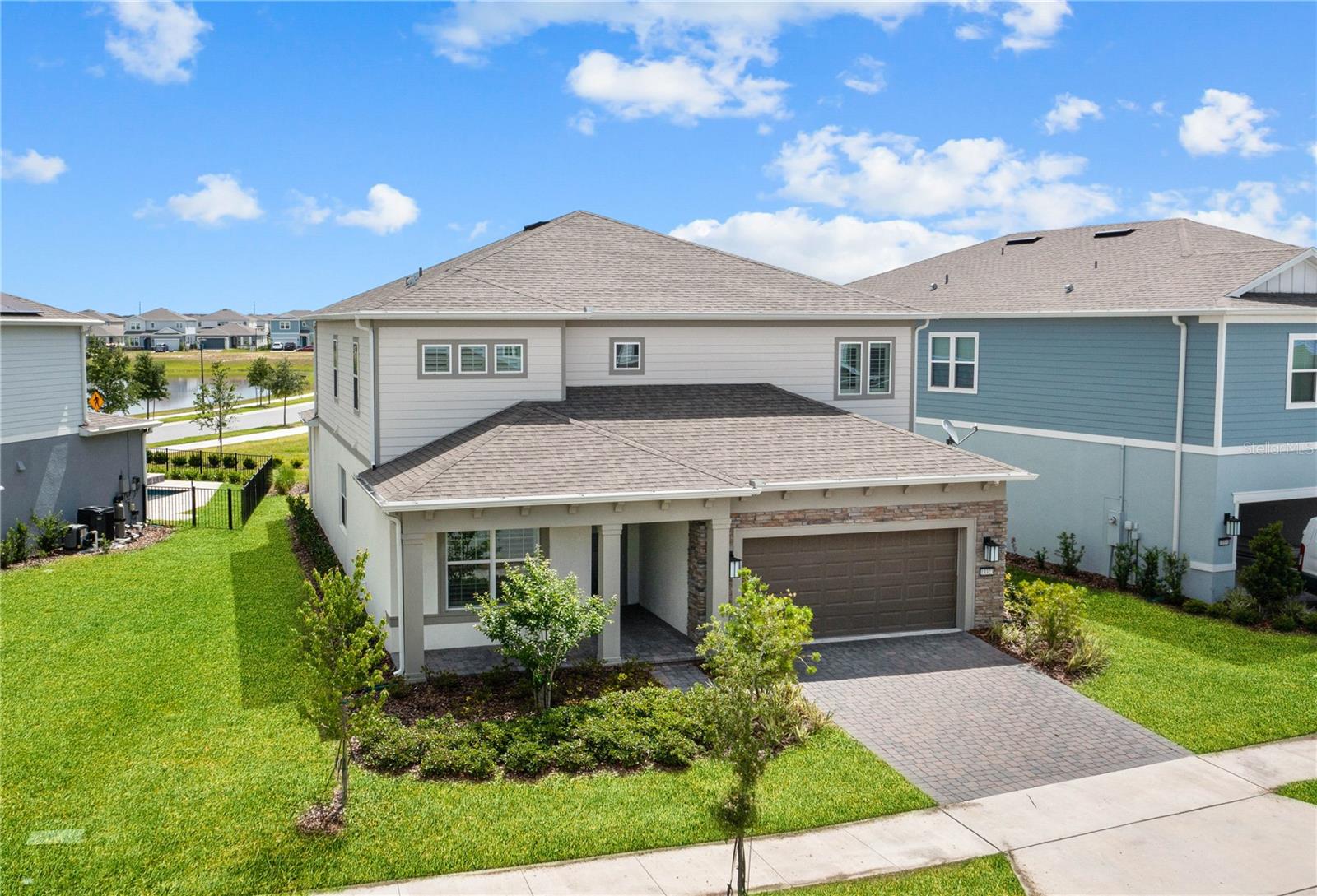 *PARK-VIEW, CUSTOM LUXURY HOME WITH NO REAR NEIGHBORS* This custom luxury home has one of the most desired floor plans in Lake Nona's highly sought after GATED community. It features 5 Bedrooms, 4.5 Baths, office, upstairs loft, an impressive great room with custom built in entertainment FEATURE WALL with fireplace and HAND-CRAFTED wood beams that you must see in person to fully appreciate. The outdoor living space is the perfect place to entertain family and friends; it features an extended custom lanai, full outdoor kitchen, built-in entertainment system, roll down screens and an expansive backyard with scenic park views. On the main level is the office with french doors, flex space/dining room, a Grand Gourmet Kitchen with butlers pantry that has every upgrade imaginable: floor to ceiling custom cabinets, built in double ovens, quartz counters, herringbone tile backsplash, wine fridge/bar, custom pantry, and wood plank floors throughout. The open layout kitchen with dine-in island flows into the expansive great room which has plenty of natural light complimented by views of water and s park. Upstair you'll find the loft and 3 secondary bedrooms and baths. The large primary suite features plenty of windows, dual vanities, a custom super shower with designer tile work, rain shower head, and built-in closets. Isles of Lake Nona is located in the heart of Lake Nona with all A-rated schools. It includes landscaping, Gigabit Fiber internet and features a social/outdoor lifestyle with 40% greenspace, many parks, fitness center, resort style pools, etc... Minutes from Shopping, Restaurants, Medical City, VA Hospital, USTA, KPMG, and Easy access to Orlando's expressways.